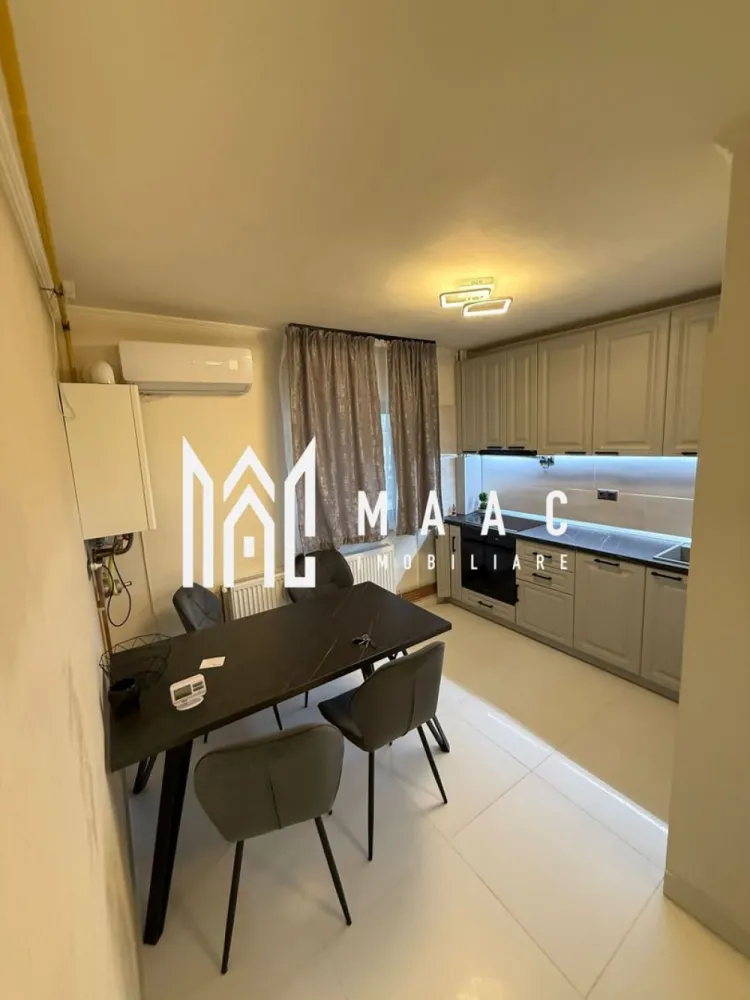 APARTAMENT 3 CAMERE RENOVAT| CENTRALA PROPRIE| ZONA PIATA OSTROVENI - MAAC Imobiliare vă propune spre închiriere un apartament spațios cu 3 camere, situat la parter, pe strada Ostroveni, într-o zonă liniștită și foarte bine conectată,in vecinatatea Bulevardului Dem Radulescu. Locuința are o suprafață generoasă de 80 mp și este compartimentată eficient în două dormitoare, living, bucătărie închisă, hol și multiple spații de depozitare, oferind confort și funcționalitate pentru întreaga familie. Apartamentul a fost recent renovat și este complet mobilat și utilat, fiind pregătit pentru mutare imediată. Facilități: ✔ Centrală termică proprie ✔ 2 aparate de aer condiționat ✔ Mașină de spălat vase ✔ Mobilier și electrocasnice complete Un mare avantaj îl reprezintă poziționarea excelentă: în imediata apropiere a Pieței Ostroveni, Școlii Nr. 9, precum și a numeroaselor magazine și farmacii, oferind acces rapid la toate facilitățile necesare vieții de zi cu zi. Datorită compartimentării și dotărilor, apartamentul oferă un nivel ridicat de confort pentru locuirea zilnică. Ideal pentru familie sau persoane care își doresc un spațiu generos, bine organizat și gata de utilizare. Pentru mai multe detalii și programarea unei vizionări, vă stăm la dispoziție! }}