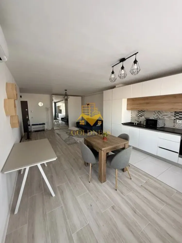 2 Camere Openspace, Iris, Garaj, Iris,Modern, Zona Piata 1 Mai,Spital - GOLDNESS Imobiliare vă propune spre închiriere un apartament cu 2 camere complet mobilat și utilat, la etajul 5 într-un imobil de 8 etaje, în Cartierul . Loc de parcare subteran 70E! Se află în apropierea stațiilor de transport în comun, magazine, restaurante, spații verzi, farmacii, etc. Apartamentul este compartimentat astfel: - dormitor cu pat matrimonial, dressing, noptiere - living cu bucatarie open space complet utilată și mobilată, canapea extensibilă, loc de servit masa - baie cu cada, calorifer port prosop și dulap pentru depozitare. -balcon 5 mp. Imobilul este dotat cu toate cele necesare- centrală proprie, frigider, aragaz, hotă, mașină de spălat haine, etc. Dacă sunteți interesați de acest apartament și doriți să îl vizionați, dar și pentru alte oferte nu ezitați să ne contactați telefonic sau prin e-mail. Vă stăm la dispoziție! Pentru intermediere se percepe un comision de 50% din prețul chiriei! }}