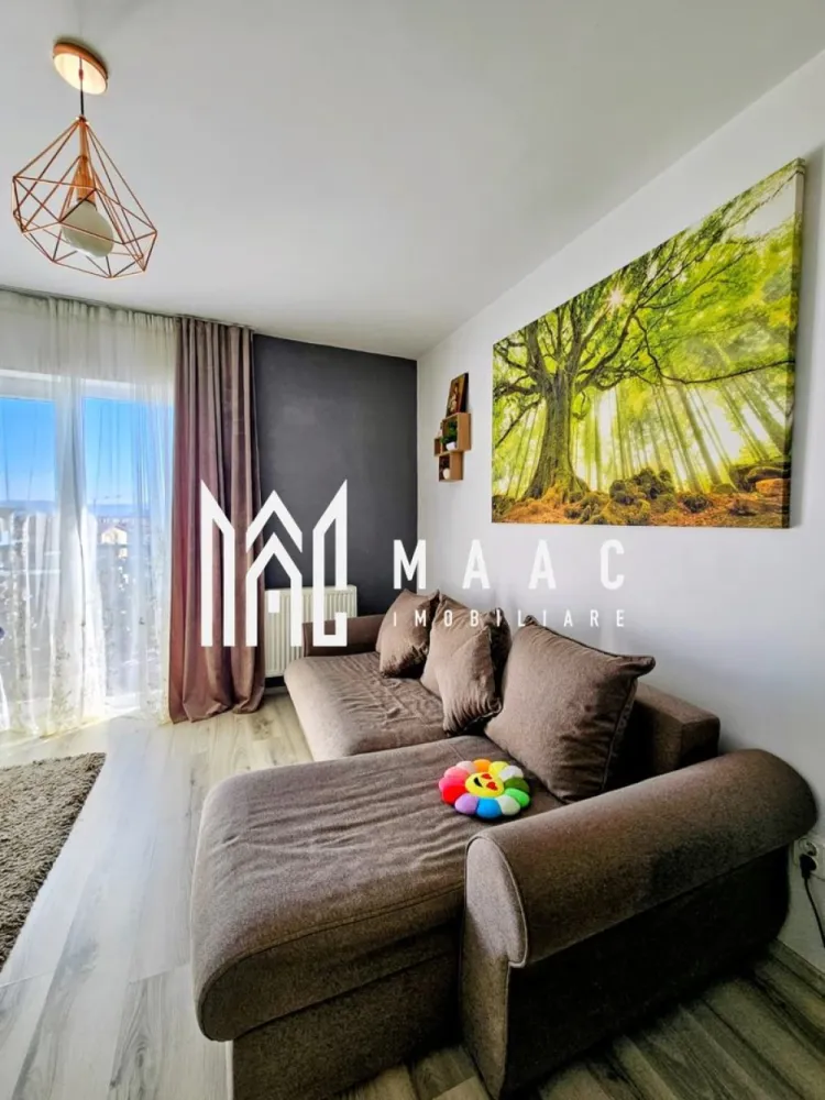 Apartament 3 camere | Balcon | Loc de parcare | Magnolia - MAAC Imobiliare va prezinta un apartament cu 3 camere situat in cartier Magnolia. Localizare: Apartamentul este situat în cartierul Magnolia, într-un bloc nou cu lift, într-o zonă liniștită și bine organizată, cu acces facil către puncte de interes, mijloace de transport, magazine și spații verzi. Imobilul se află la etajul 4 din 8, oferind o vedere deschisă și orientare sud-vestică, ideală pentru lumină naturală pe tot parcursul zilei. Caracteristici: Tip apartament: 3 camere semi-decomandat Suprafață utilă: 52 mp Suprafață totală: 61 mp Etaj: 4 din 8 Bloc dotat cu lift Balcon: 9 mp, accesibil din living și dintr-un dormitor Compartimentare: Hol de intrare Baie complet echipată, dotată cu cabină de duș, mobilier sanitar și mașină de spălat rufe Living open space, cu zonă de relaxare și bucătărie deschisă, complet mobilată și utilată, inclusiv cu electrocasnice Două dormitoare, fiecare mobilat cu pat, șifonier și noptiere Balcon generos de 9 mp, cu acces din living și dintr-un dormitor Dotări și finisaje: Aer condiționat Centrală termică proprie Ferolli cu calorifere în toate camerele Finisaje: pardoseli, uși interioare noi, tâmplărie PVC cu geam termopan Ușă metalică la intrare. Parcare: Apartamentul dispune de loc de parcare cu carte funciară separată. Pentru mai multe detalii precizati telefonic ca ati vazut anuntul cu ID: CP2979414 }}