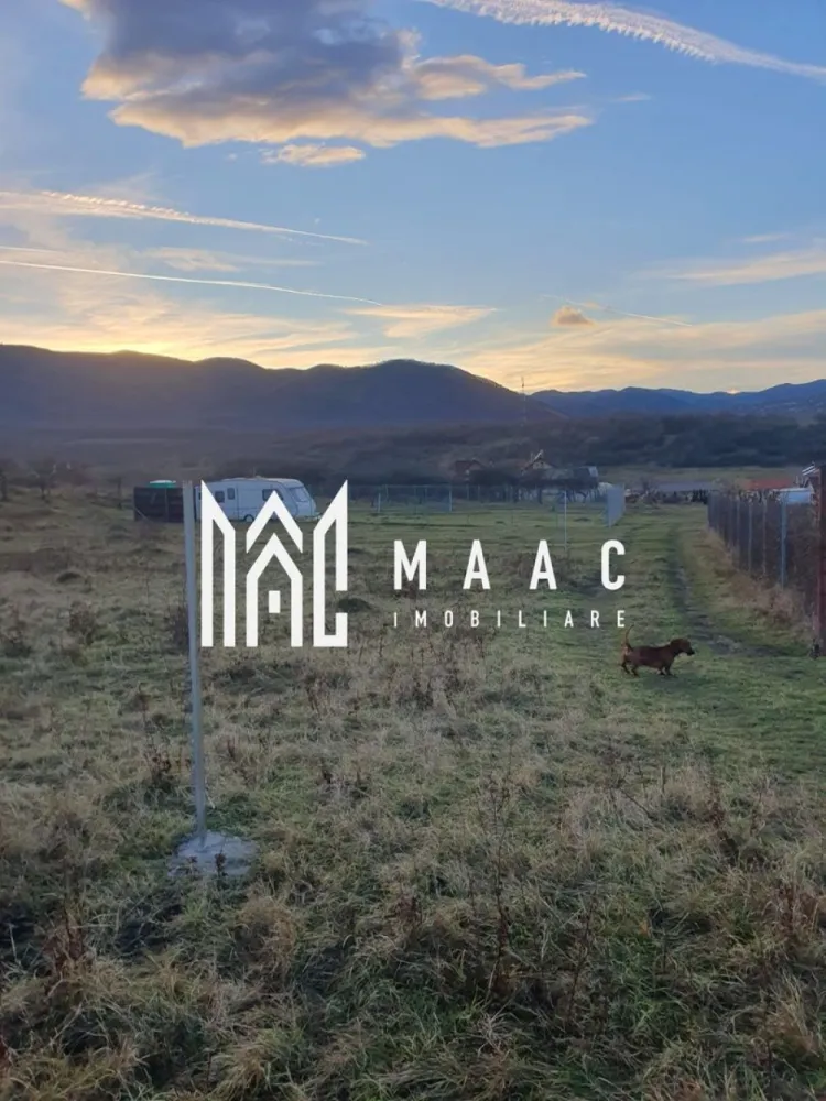 Teren Intravilan | 467Mp | Zona Cisnădie - MAAC Imobiliare vă propune spre vânzare un teren intravilan situat într-o zonă excelentă din Cisnădie. O oportunitate ideală pentru construirea casei mult dorite sau pentru investiție. Detalii teren Suprafață totală: 467 mp Cota parte la drum privat inclusă Deschidere: 18,67 m Adâncime: 25 m Regim: intravilan Terenul se află într-o zonă liniștită, cu acces facil, oferind intimitate și potențial excelent pentru dezvoltare rezidențială. Pentru mai multe detalii sau pentru a programa o vizionare, vă rugăm să ne contactați, specificând ID:CP2825782 }}