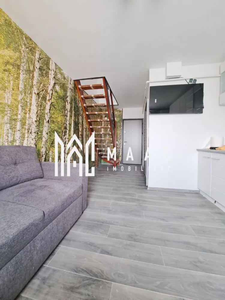 Apartament 2 camere | Traian | mobilat si utilat | 44mp - MAAC IMOBILIARE vă propune spre vânzare un apartament modern cu 2 camere, situat la mansardă, în cartierul Traian. Proprietatea face parte dintr-un imobil nou, construit din BCA, și beneficiază de o suprafață utilă de 44 mp, fiind inteligent compartimentată pe două niveluri – ideală pentru un stil de viață modern și confortabil. Compartimentare: Parter: living luminos cu bucătărie open-space și baie Etaj: 2 dormitoare primitoare, bine luminate natural Apartamentul se vinde complet mobilat și utilat, fiind nelocuit până în prezent – totul este nou, pregătit pentru viitorul proprietar. Datorită compartimentării eficiente și a poziționării, proprietatea reprezintă o alegere excelentă atât pentru locuință personală, cât și pentru investiție (închiriere pe termen lung sau regim hotelier). Localizare avantajoasă: situat în cartierul Traian, cu acces facil la mijloace de transport, magazine, unități de învățământ și centre comerciale. Pentru mai multe detalii sau pentru programarea unei vizionări, echipa MAAC IMOBILIARE vă stă cu drag la dispoziție! CP2984243 }}