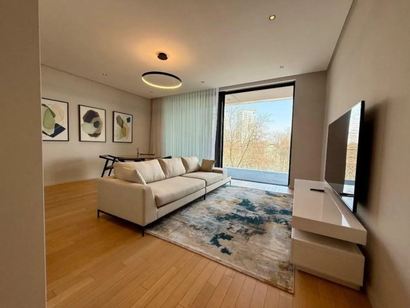 Rahmaninov one bedroom at Verdi Park - The attention to details and elegance are two concepts strongly desired by Rahmaninov Residence, and for us as well, who have chosen to invest in this exclusive project. We thought about the possible needs of our best customers, and for this reason, the proximity to the lake and above all, the view to Verdi Park, in a period like this, convinced us that this is the best option we can offer! Built to achieve the highest standards of comfort and luxury in Bucharest, the One Rahmaninov project offers you not only a place to live but also an experience, made possible by a 24/7 concierge service in a luxurious welcoming lobby where you will always be greeted by someone ready to take care of you. The apartment is divided in such a way to be dynamic, bright, spacious and carefully organized. Key features: - Park view with private terrace of 24 sqm and lots of natural light - Ceiling height of 3 m - Filomuro interior doors - REHAU floor heating system - REHAU built in ceiling cooling system - Fully equipped kitchen - Fully furnished - 2 bathrooms - 1 underground parking place