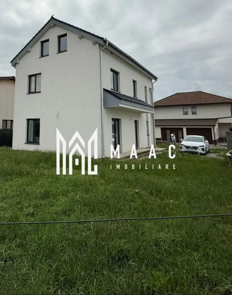 Casa 3 camere | Teren | 126 MPU | Cristian - Maac Imobiliare vă propune spre vânzare o casă individuală situată în comuna Cristian, într-o zonă liniștită, exclusiv de case, la doar câteva minute de centrul localității. Proprietatea se remarcă prin construcția solidă, compartimentarea practică, spațiile generoase și potențialul excelent de amenajare. Descrierea proprietății Casa are o suprafață utilă de 126 m², fiind amplasată pe un teren de 520 m², ideal pentru amenajarea unei grădini, a unui foișor, spațiu de relaxare sau loc de joacă pentru copii. Construcția este realizată pe structură de beton, cu placă turnată între etaje, ceea ce conferă stabilitate și durabilitate pe termen lung. În plus, proprietatea dispune de pod mansardabil de aproximativ 60 m², accesibil prin scară interioară din beton. Podul este pregătit pentru amenajare, având curent, apă și scurgere de WC deja trase – un avantaj important pentru extinderea spațiului locuibil. Compartimentare Parter: Hol generos la intrare Living luminos de 26 m², ideal pentru zona de zi Bucătărie separată, bine delimitată de restul casei Baie Spațiu de depozitare practic amplasat sub scară Etaj: 3 camere spațioase, dintre care una dispune de dressing și ieșire pe balcon, baie Acces către podul mansardabil cu o suprafata de 60 m². Spațiu generos, cu potențial pentru camere suplimentare Structură de beton armat Placă de beton între parter și etaj Tavan fals din gips-carton + vată minerală pentru o izolație suplimentară Ferestre premium cu 3 foi de sticlă, oferind eficiență energetică Izolație exterioară cu polistiren de 10 cm EPS80 Acoperiș solid, cu posibilitate de mansardare Proprietatea este racordată la curent, apă și canalizare. Nu dispune de gaze, însă încălzirea se realizează cu un termosemineu pe peleți, nou, neutilizat până în prezent — o soluție economică, modernă și foarte eficientă. Zona este foarte liniștită, cu vecini civilizați, ideală pentru cei care își doresc confortul unei comunități bine așezate, fără aglomerația orașului. Pentru mai multe detalii si programarea unei vizionari, va invitam sa contactati Maac Imobiliare specificand ID: CP2084453 }}