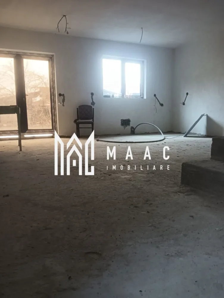 Casa Babeni | Zona Centrala | 4 Camere - MAAC Imobiliare vă propune spre vânzare o casă situată în orașul Băbeni, județul Vâlcea, amplasată într-o zonă centrală, cu acces facil către toate punctele de interes. Imobilul este în curs de construcție, oferind viitorului proprietar oportunitatea de a-l amenaja și personaliza după propriul gust. Compartimentare: Living cu bucătărie open-space 3 dormitoare 2 băi Caracteristici și avantaje: Zonă centrală Toate utilitățile disponibile Panouri solare instalate Proiect modern și funcțional Proprietatea necesită amenajări interioare, fiind ideală pentru cei care doresc să își creeze o locuință exact după preferințe, beneficiind în același timp de un preț foarte avantajos. Ideală atât pentru locuință permanentă, cât și pentru investiție. Pentru mai multe detalii și programarea unei vizionări, vă rugăm să contactați MAAC Imobiliare. - CP2986544 }}