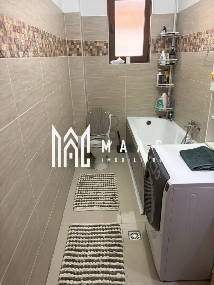 Apartament | 2 Camere | 56 Mp | Balcon | Șelimbăr - MAAC Imobiliare vă propune spre vânzare un apartament modern și primitor, situat chiar la intrarea în Șelimbăr, într-o zonă accesibilă și în plină dezvoltare, cu acces rapid către Sibiu și principalele puncte de interes. Suprafață utilă: 56 mp Balcon: 7 mp Apartamentul este complet mobilat, oferind un ambient plăcut și fiind pregătit pentru mutare imediată, fără investiții suplimentare. Compartimentare eficientă: 1 dormitor confortabil Living spațios și luminos Bucătărie separată Baie modernă Balcon generos de 7 mp, ideal pentru relaxare Locuința se remarcă prin compartimentarea practică, lumina naturală din abundență și atmosfera caldă, fiind potrivită atât pentru locuit, cât și ca investiție sigură. Datorită poziționării excelente, proprietatea beneficiază de acces rapid către Sibiu, centre comerciale, mijloace de transport și alte facilități importante. Dacă îți dorești un cămin bine poziționat, cu spații bine gândite și confort sporit, acest apartament poate fi alegerea ideală. Pentru mai multe detalii sau pentru programarea unei vizionări, vă rugăm să ne contactați specificând ID:CP2985167 }}