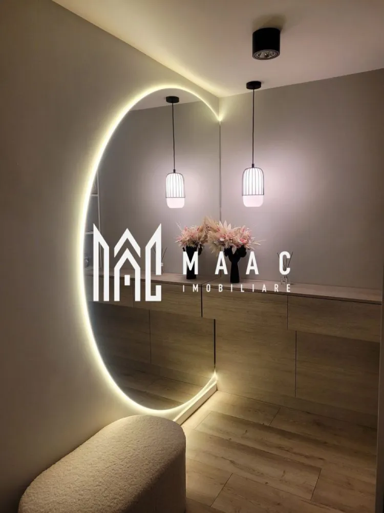 Casă individuală | 210 mp | Curte 200 mp | 5 Camere | 3 Băi | Șelimbăr - MAAC Imobiliare vă propune spre vânzare o casă spațioasă și elegantă, ideală pentru o familie care își dorește confort, funcționalitate și un ambient modern, bine organizat. Proprietatea beneficiază de o suprafață utilă de 211 mp și o curte de aproximativ 200 mp, oferind un echilibru optim între spațiul interior generos și zona exterioară dedicată relaxării. Locuința este compartimentată inteligent, cu încăperi luminoase și bine dimensionate, fiind potrivită atât pentru locuire permanentă, cât și pentru investiție pe termen lung. Se vinde complet mobilată și utilată, cu finisaje de calitate, gata pentru mutare imediată fără necesitatea unor investiții suplimentare. Compartimentare: -5 camere spațioase, ideale pentru living, dormitoare sau birou -dressing generos de 14 mp -3 băi moderne, amenajate cu atenție la detalii Exterior: -curte privată de aproximativ 200 mp, ideală pentru relaxare sau amenajare spațiu verde -carport pentru protecția mașinii Proprietatea se evidențiază prin suprafețele generoase, compartimentarea practică și atmosfera primitoare, fiind o alegere excelentă pentru cei care caută o locuință complet echipată într-un cadru confortabil. Pentru mai multe detalii, vă rugăm să menționați CP2988696 la telefon. }}