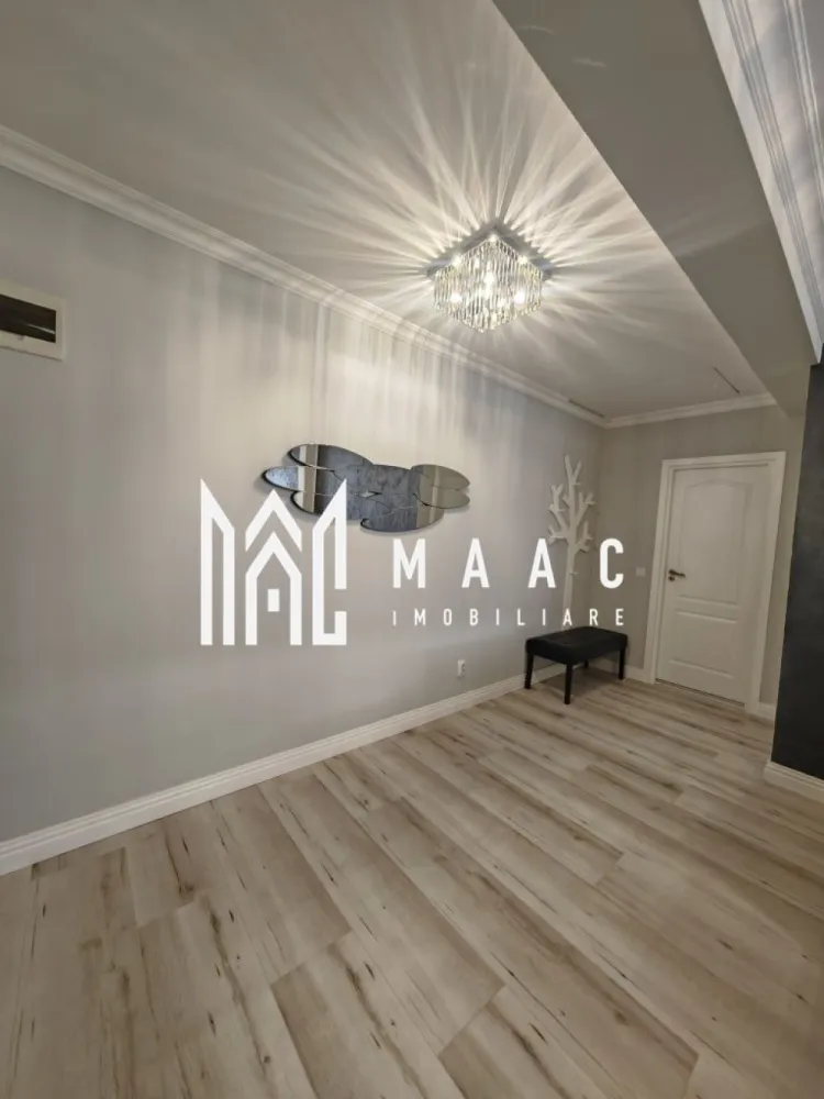 Apartament 2 camere | Etaj 3 | Parcare subterana | Central - Apartamentul are o suprafață utilă de 51 mp și este situat la etajul 3 al unei vile cu 3 etaje, construită în anul 2013. Locuința este complet renovată, cu mobilier și electrocasnice noi, fiind pregătită pentru mutare imediată. Compartimentarea este practică și modernă: living luminos cu bucătărie open space dormitor confortabil baie balcon închis și izolat termic Imobilul dispune de curte interioară închisă, cu poartă automată cu telecomandă, oferind siguranță și intimitate. Apartamentul beneficiază și de loc de parcare subteran. Se închiriază complet mobilat și utilat, fiind dotat cu: mașină de spălat haine mașină de spălat vase plită electrică cuptor cuptor cu microunde frigider centrală termică proprie TV Smart nou (140 cm) colțar și pat noi Condiții de închiriere: perioadă minimă contractuală: 12 luni garanție în cuantumul unei chirii se acceptă doar o singură persoană nu se acceptă animale de companie Pentru mai multe detalii sau pentru programarea unei vizionări, contactați echipa MAAC Imobiliare. ID: CP2987816. }}