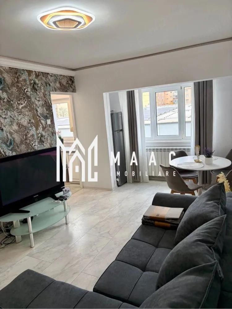 Garsoniera Valea Aurie | 25 MPU | Etaj 2 - MAAC Imobiliare vă propune spre închiriere o garsonieră situată în Sibiu, zona Valea Aurie, într-un cartier liniștit și apreciat pentru accesibilitate și confortul oferit locatarilor. Locuința este renovată, luminoasă și amplasată la etajul 2, etaj intermediar, oferind un cadru plăcut pentru locuire. Garsoniera are o suprafață utilă de 25 mp și este compartimentată eficient, fiind ideală pentru o persoană sau un cuplu. Compartimentare: -bucătărie închisă -zonă de dormit Proprietatea se închiriază complet mobilată și utilată, fiind pregătită pentru mutare imediată. Dotări: -aragaz -mașină de spălat haine -mobilier complet -electrocasnice necesare Pentru mai multe detalii, vă rugăm să menționați CP2988544 la telefon. }}