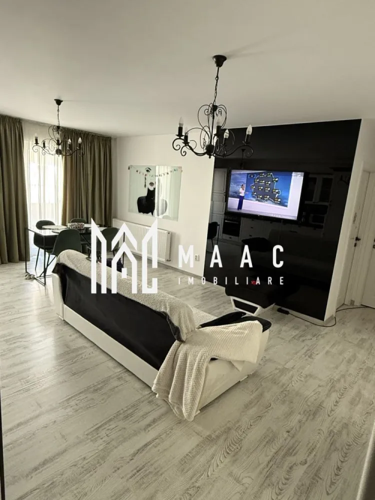 Apartament 3 camere | Parcare | Decomandat | City Rezidence - MAAC Imobiliare vă propune spre vânzare un apartament spațios în City Residence, situat într-o zonă centrală a Sibiului, ideal atât pentru locuire personală, cât și pentru investiție. Proprietatea are o suprafață utilă de 64 mp și beneficiază de o terasă generoasă de 12 mp, un avantaj important pentru confortul zilnic. Apartamentul este amplasat la etajul 4 din 5, într-un imobil modern dotat cu lift. Locuința se vinde mobilată și utilată, fiind pregătită pentru mutare imediată sau pentru exploatare în regim de închiriere. Compartimentare practică Living open space cu bucătărie 2 dormitoare 2 băi Hol Terasă mare – 12 mp, ideală pentru zonă de relaxare Avantaje Ansamblu rezidențial modern – City Residence Zonă centrală, cu acces rapid către punctele de interes Apartament luminos și bine compartimentat Lift în imobil Terasă spațioasă, greu de găsit la această categorie Potrivit pentru locuit sau investiție cu randament bun Localizare: City Residence, Sibiu Pentru mai multe detalii și programarea unei vizionări, vă rugăm să ne contactați menționând ID: CP2945687. }}