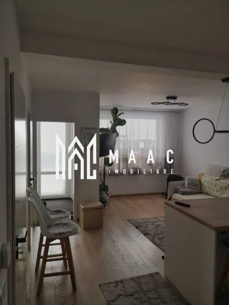 Casa 4 Camere I Duplex I Curte I Parcare I Arhitectilor - Se oferă spre vânzare o casă modernă, eficient compartimentată, ideală pentru o familie care își dorește confort, intimitate și un spațiu bine organizat. Suprafață și compartimentare: suprafață utilă: 80 mp regim de înălțime: Parter + Etaj Parter: living cu bucătărie open-space baie cu geam de aerisire debara casa scării Etaj: 3 dormitoare (2 cu acces la balcon și vedere panoramică spre munți) baie spațioasă cu cadă și geam mare dressing hol cu acces către toate încăperile Exterior: curte amenajată de 70 mp pavaj + zonă verde magazie din lemn (~15 mp), acoperită cu țiglă metalică spațiu ideal pentru relaxare și servirea mesei 2 locuri de parcare (în curte și lateralul casei) Finisaje și dotări premium: centrală termică proprie pe gaz încălzire în pardoseală cu termostate în fiecare cameră aer condiționat la etaj parchet dublu stratificat și gresie băi complet finisate cu faianță și obiecte sanitare instalații electrice complete (prize, întrerupătoare, corpuri iluminat) Bucătărie: mobilier realizat pe comandă din MDF vopsit electrocasnice încorporate: plită pe inducție cuptor electric mașină de spălat vase hotă Alte avantaje: posibilitate de predare complet mobilată compartimentare ideală pentru familie priveliște frumoasă și zonă liniștita Locuință modernă, pregătită pentru mutare Spațiu exterior ideal pentru relaxare Confort ridicat și eficiență energetică PEntru informati si vizionari: CP2994672 }}