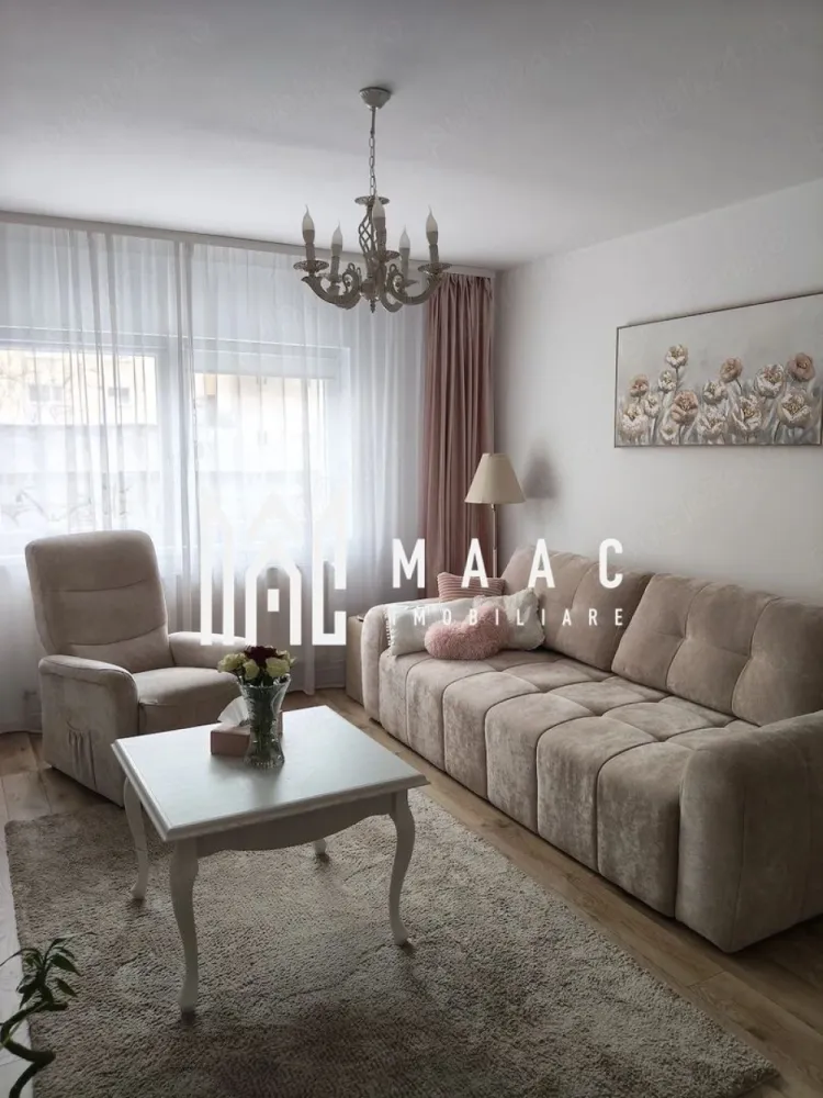 Apartament 2 camere | Parter | 60 MPU | Renovat | Terezian - MAAC Imobiliare vă prezintă spre vânzare un apartament cu 2 camere, situat la parter înalt în zona Terezian din Sibiu. Caracteristici: Apartament complet decomandat. Suprafață utilă de aproximativ 60 mp. Situat la parter înalt. Recent renovat, pregătit pentru mutare imediată. Dispune de pivniță la subsolul imobilului. Compartimentare: Hol de acces. Living. Bucătărie separată. Dormitor. Baie cu geam de aerisire. Dotări și îmbunătățiri: Izolație exterioară realizată cu vată bazaltică de 10 cm. Centrală termică proprie și încălzire prin calorifere. Sistem de canalizare individual. Instalațiile electrice și sanitare au fost înlocuite recent. Mobilare și utilare: Apartamentul se vinde complet mobilat și utilat, conform fotografiilor. Ideal pentru locuire imediată sau investiție. Avantaje proprietate: Compartimentare eficientă și practică. Renovare recentă, fără necesitatea unor investiții suplimentare. . Avantaje locație Aproape de magazine, școli, mijloace de transport și alte facilități. Pentru mai multe detalii precizati telefonic ca ati vazut anuntul cu ID: CP2987752 }}