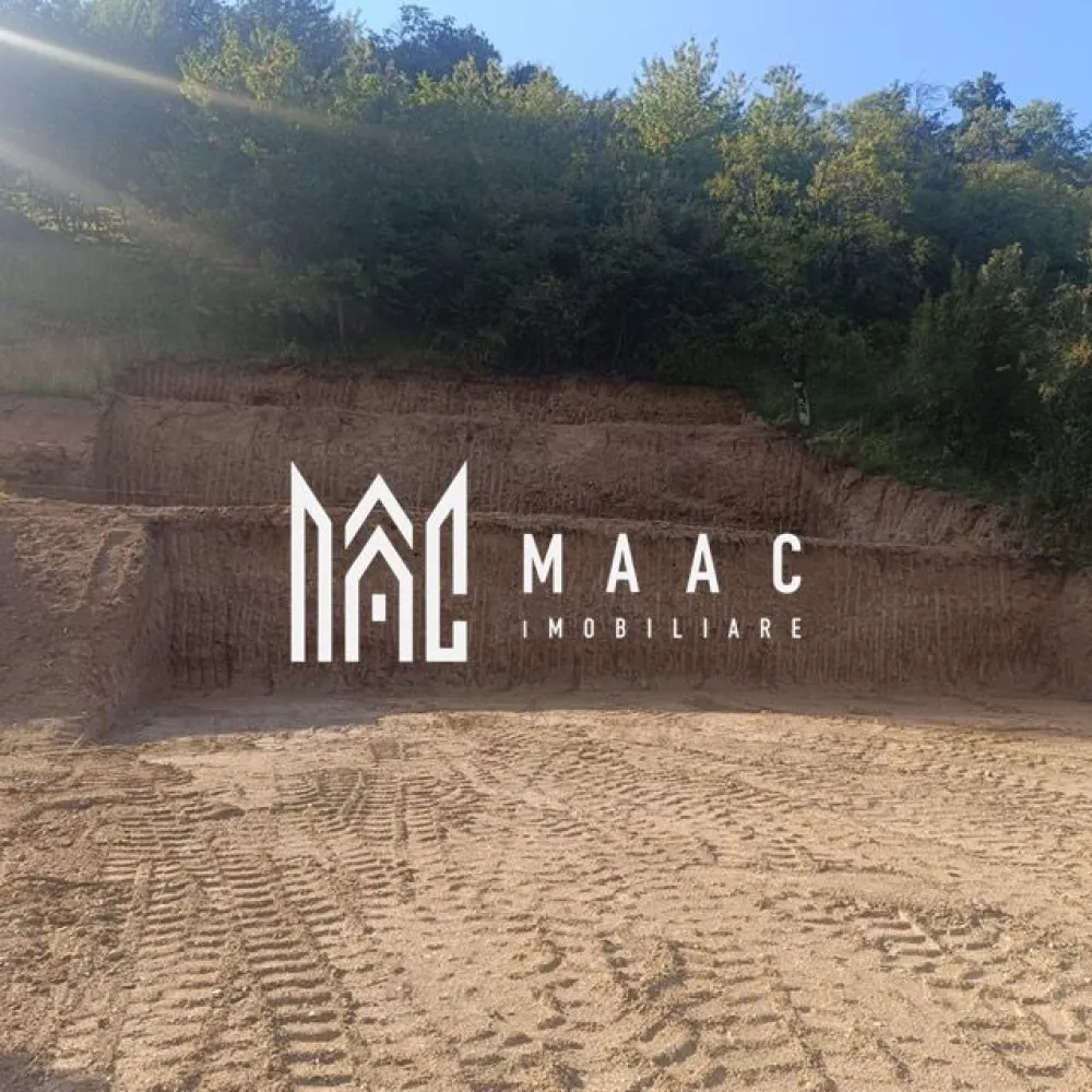 TEREN INTRAVILAN 1641 mp | PUZ APROBAT | Cisnadioara - MAAC Imobiliare vă propune spre vânzare un teren intravilan situat în zona Cisnădioara, pe strada Silvicultorilor, într-o locație liniștită, ideală pentru construcția unei locuințe permanente sau a unei case de vacanță. Amplasamentul oferă un cadru natural deosebit, cu priveliște frumoasă, fiind potrivit pentru cei care își doresc aer curat, intimitate și un stil de viață relaxat, departe de agitația urbană. Terenul are o suprafață de 1641 mp și beneficiază de o deschidere de 17,5 metri la stradă, ceea ce permite multiple opțiuni de construire și valorificare eficientă a spațiului. Proprietatea dispune de utilități precum apă, curent și canalizare, facilitând dezvoltarea rapidă a unui proiect rezidențial. Această proprietate reprezintă o oportunitate potrivită atât pentru investiție, cât și pentru dezvoltarea unei locuințe într-o zonă apreciată din apropierea Sibiului. Se acceptă schimb cu apartament în Sibiu. Pentru mai multe detalii, vă rugăm să menționați telefonic numărul CP2988018. }}