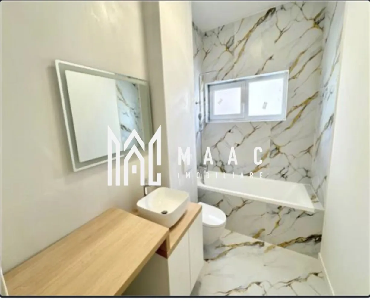 APARTAMENT 2 CAMERE I DAVINCI I FINISAT LA CHEIE - MAAC Imobiliare vă propune spre vânzare un apartament cu 2 camere, compus din bucătărie, baie și balcon generos, ideal pentru cei care își doresc un spațiu modern, bine organizat și confortabil. Locuința se remarcă prin finisaje de calitate și un ambient plăcut, fiind situată într-o zonă cu numeroase spații verzi și drumuri pavate, aspecte ce contribuie la un stil de viață relaxat și echilibrat. Apartamentul este finisat la cheie, oferind avantajul unei mutări rapide, fără investiții suplimentare. Proprietatea este dotată cu aer condiționat și jaluzele electrice, asigurând un nivel ridicat de confort și intimitate pentru viitorii proprietari. Disponibilitate imediată. Pentru mai multe detalii, vă rugăm să menționați telefonic numărul CP2993108. }}