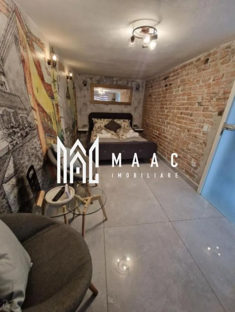 Garsoniera | 24 MPU | Investitie | Ultracentral - MAAC Imobiliare vă propune spre vânzare o garsonieră situată în zona ultracentrală a Sibiului, ideală pentru investiție. Garsoniera are o suprafață utilă de 24 mp, este complet renovată, mobilată și utilată, fiind pregătită pentru utilizare imediată. Caracteristici principale Suprafață utilă: 24 mp Compartimentare eficientă Se vinde complet mobilată și utilată Renovată integral Avantaje Funcționează în prezent în regim hotelier Scor Booking 9.2 Posibilitate de preluare și continuare a activității Nu necesită investiții suplimentare Zonă centrală, cu acces rapid către punctele de interes Proprietatea este potrivită pentru cei care caută o investiție cu randament imediat sau o locuință compactă, bine poziționată. Pentru mai multe detalii și programarea unei vizionări, vă rugăm să ne contactați menționând ID: CP2995664 }}
