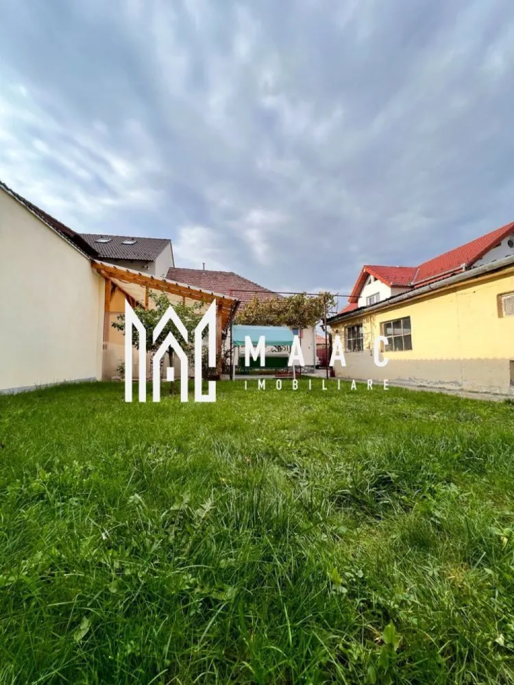 Din Octombrie 2026 I Casa de inchiriat Sibiu - Casa cu Suflet și Viitor În inima unui cartier plin de viață, stătea o casă care purta povestea a trei generații. Avea trei camere, două băi și o pivniță tăcută, unde răsuna ecoul amintirilor. Terenul de 420 de metri pătrați era o oază de liniște, cu un măr bătrân care înflorea în fiecare primăvară. Încălzirea centrală ținea departe frigul, învăluind fiecare colț în căldură, ca un braț protector. Locația era un vis: la câțiva pași se întindea un parc cu alei umbrite, perfect pentru plimbări de dimineață. Supermarketurile și restaurantele cu specific local erau la doar cinci minute, iar școlile și universitățile din apropiere umpleau cartierul de tineret și energie. Casa era mai mult decât un adăpost; era un punct de plecare spre lume. Dar această casă avea un vis mai mare. În octombrie sau noiembrie a acestui an, ea avea să se transforme. Finisajele elegante, alese cu grijă, urmau să fie așezate, iar un etaj nou urma să se ridice spre cer. Destinația? Birouri moderne, spații creative, un loc unde ideile puteau prinde zbor. Suprafața utilă avea să se dubleze, ajungând la 210 de metri pătrați, gata să primească vise și proiecte. Noul etaj nu era doar o extindere; era o promisiune. Promisiunea că vechiul și noul puteau trăi împreună, că o casă cu istorie putea deveni un colț de inspirație. În timp ce soarele asfințea peste parc, casa aștepta cu încredere transformarea, știind că, indiferent de destinul ei, va rămâne un punct de legătură între trecut și viitor, între căldura unei locuințe și energia unui spațiu de lucru. Pentru mai multe detalii precizati telefonic ca ati vazut anuntul cu ID CP2992853 }}