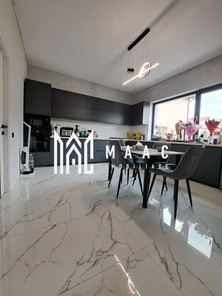 Casa deosebita P+E |mobilata si utilata| teren 1277mp| Vladești - MAAC IMOBILIARE vă propune spre vânzare o proprietate de excepție, situată stradal în Vlădești, județul Vâlcea Descoperă o locuință completă, unde spațiul generos, compartimentarea inteligentă și poziționarea excelentă se îmbină perfect pentru a crea un cămin ideal pentru o familie. Amplasată stradal, într-o zonă excelentă, cu acces rapid către oraș și toate facilitățile necesare, casa îmbină perfect eleganța, spațiul generos și confortul modern. Casa construita in anul 2025, dispune de toate utilitățile (apă, gaz, curent electric, canalizare), asigurând confortul necesar unei locuințe moderne. Localizare premium: Imobilul este amplasat la strada principală, într-o zonă extrem de accesibilă, având în imediata apropiere toate punctele de interes necesare, dar si acces rapid către Râmnicu Vâlcea. Detalii proprietate: Regim de înălțime: Parter + Etaj Suprafață utilă totală: 232 mp Teren: 1.277 mp Construcție solidă, bine compartimentată Proprietate intabulată, cu acte la zi Compartimentare – Parter: Parterul este gândit pentru zona de zi și activitățile comune: Living generos (40,6 mp) – spațiu luminos, ideal pentru relaxare și socializare Bucătărie spațioasă (18,4 mp) – complet mobilată și utilată Birou (17 mp) – perfect pentru work-from-home Baie + grup sanitar Debara / spații de depozitare Hol amplu + casa scării (19,9 mp) Terasă (32,3 mp) – ideală pentru petrecerea timpului liber Compartimentare – Etaj: Zona de noapte oferă confort și intimitate: 3 dormitoare (inclusiv unul matrimonial foarte generos de 26,6 mp) 2 dressinguri 3 băi – pentru confort maxim Hol spațios (19,1 mp) Terasă mare (41,5 mp) – priveliște deschisă, perfectă pentru relaxare Exterior și facilități: Curte generoasă, ideală pentru amenajare grădină, foișor sau zonă de relaxare Anexă gospodărească (27,8 mp) – perfectă pentru depozitare sau diverse activități Acces facil auto în curte Proprietate ce oferă intimitate și multiple posibilități de amenajare ✅ Avantaje majore: ✔ Locație excelentă – stradal ✔ Casă complet mobilată și utilată ✔ Nu necesită investiții – mutare imediată ✔ Compartimentare ideală pentru familie numeroasă ✔ Suprafață mare utilă + teren generos ✔ Potrivită atât pentru locuință, cât și pentru investiție (ex: pensiune, sediu firmă) Această proprietate reprezintă o oportunitate rară pe piață — o casă spațioasă, modernă și bine poziționată, pregătită să devină „acasă” fără niciun compromis. 📞 Pentru detalii suplimentare și programarea unei vizionări, contactați echipa MAAC IMOBILIARE! CP3004798 }}