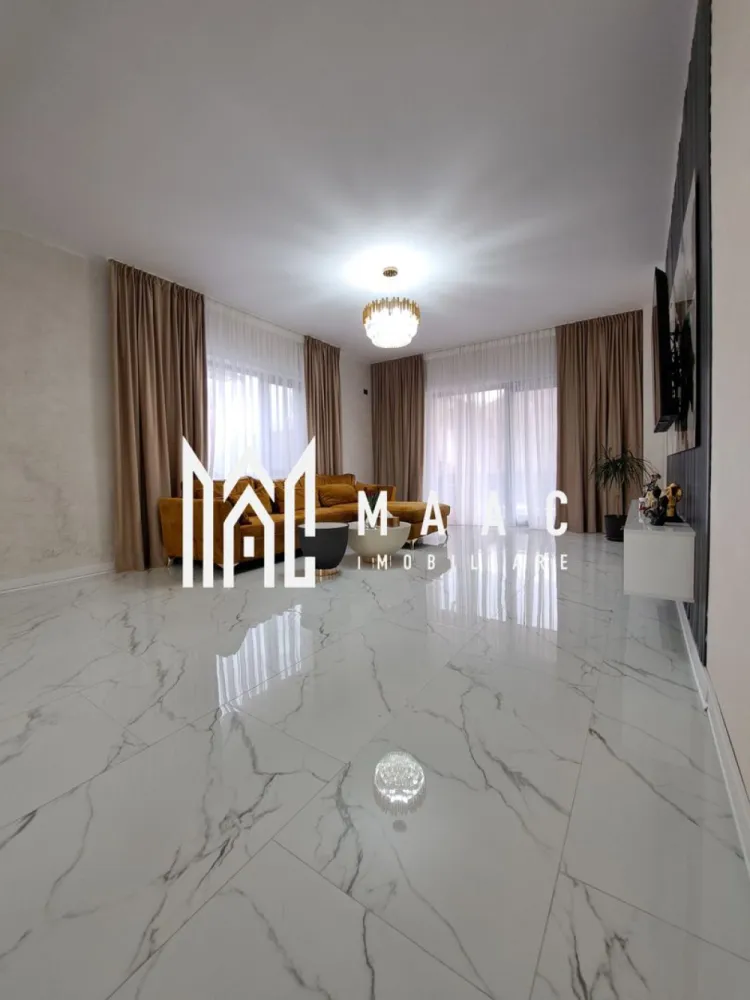 Casa deosebita P+E |mobilata si utilata| teren 1277mp| Vladești - MAAC IMOBILIARE vă propune spre vânzare o proprietate de excepție, situată stradal în Vlădești, județul Vâlcea Descoperă o locuință completă, unde spațiul generos, compartimentarea inteligentă și poziționarea excelentă se îmbină perfect pentru a crea un cămin ideal pentru o familie. Amplasată stradal, într-o zonă excelentă, cu acces rapid către oraș și toate facilitățile necesare, casa îmbină perfect eleganța, spațiul generos și confortul modern. Casa construita in anul 2025, dispune de toate utilitățile (apă, gaz, curent electric, canalizare), asigurând confortul necesar unei locuințe moderne. Localizare premium: Imobilul este amplasat la strada principală, într-o zonă extrem de accesibilă, având în imediata apropiere toate punctele de interes necesare, dar si acces rapid către Râmnicu Vâlcea. Detalii proprietate: Regim de înălțime: Parter + Etaj Suprafață utilă totală: 232 mp Teren: 1.277 mp Construcție solidă, bine compartimentată Proprietate intabulată, cu acte la zi Compartimentare – Parter: Parterul este gândit pentru zona de zi și activitățile comune: Living generos (40,6 mp) – spațiu luminos, ideal pentru relaxare și socializare Bucătărie spațioasă (18,4 mp) – complet mobilată și utilată Birou (17 mp) – perfect pentru work-from-home Baie + grup sanitar Debara / spații de depozitare Hol amplu + casa scării (19,9 mp) Terasă (32,3 mp) – ideală pentru petrecerea timpului liber Compartimentare – Etaj: Zona de noapte oferă confort și intimitate: 3 dormitoare (inclusiv unul matrimonial foarte generos de 26,6 mp) 2 dressinguri 3 băi – pentru confort maxim Hol spațios (19,1 mp) Terasă mare (41,5 mp) – priveliște deschisă, perfectă pentru relaxare Exterior și facilități: Curte generoasă, ideală pentru amenajare grădină, foișor sau zonă de relaxare Anexă gospodărească (27,8 mp) – perfectă pentru depozitare sau diverse activități Acces facil auto în curte Proprietate ce oferă intimitate și multiple posibilități de amenajare ✅ Avantaje majore: ✔ Locație excelentă – stradal ✔ Casă complet mobilată și utilată ✔ Nu necesită investiții – mutare imediată ✔ Compartimentare ideală pentru familie numeroasă ✔ Suprafață mare utilă + teren generos ✔ Potrivită atât pentru locuință, cât și pentru investiție (ex: pensiune, sediu firmă) Această proprietate reprezintă o oportunitate rară pe piață — o casă spațioasă, modernă și bine poziționată, pregătită să devină „acasă” fără niciun compromis. 📞 Pentru detalii suplimentare și programarea unei vizionări, contactați echipa MAAC IMOBILIARE! CP3004798 }}