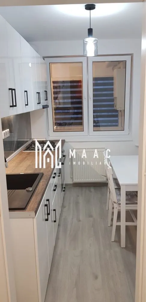 Apartament 2 Camere | 63Mp | Zona Mihai Viteazul - MAAC Imobiliare vă propune spre închiriere un apartament decomandat, cu o suprafață de 63 mp, situat la etajul 6 din 10 al unui imobil modern. Detalii și avantaje: Suprafață: 63 mp Balcon luminos cu vedere frumoasă asupra orașului Aer condiționat Finisaje de calitate superioară, design interior modern Prima închiriere – totul este nou și pregătit pentru viitorul chiriaș Fără animale de companie Locație excelentă: Apartamentul se află într-o zonă bine conectată, aproape de centre comerciale, restaurante și zone de recreere. În apropiere se află Universitatea "Lucian Blaga", instituții de învățământ și parcuri ideale pentru relaxare. Transportul public este ușor accesibil, oferind conexiuni rapide către principalele puncte de interes din oraș. Apartamentul oferă confort, lumină naturală și un ambient primitor — alegerea ideală pentru cei care caută un cămin modern și elegant. Pentru mai multe detalii sau pentru a programa o vizionare, vă rugăm să ne contactați menționând ID:CP2813289 }}