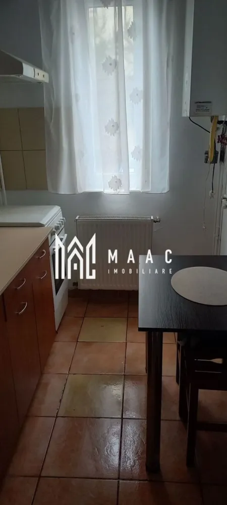 Garsonieră de închiriat Sibiu | Turnișor | 36 mp, balcon - Garsonieră de închiriat în Sibiu, zona Turnișor, cu 36 mp utili, compartimentare decomandată, balcon și mobilare completă, disponibilă pentru mutare imediată.

Detalii proprietate:
• Suprafață utilă: 36 mp (suprafață construită 43 mp)
• Compartimentare: cameră, bucătărie, baie și balcon
• Apartament decomandat, cu 1 baie și 1 bucătărie
• Stare interioară bună, într-un imobil finalizat în anul 2000
• Se închiriază complet mobilată și utilată
• Bucătărie complet mobilată și utilată, inclusiv mașină de spălat rufe
• Balcon inclus și locuință pregătită pentru mutare imediată

Locuința este amplasată în cartierul Alma - Turnișor, într-o zonă liniștită și bine conectată, cu acces facil către magazine, mijloace de transport și alte facilități urbane. Poziționarea oferă legături rapide către principalele puncte de interes din Sibiu și un plus de confort pentru viața de zi cu zi.

Cod anunț CP3217751. Contactați echipa MAAC Imobiliare pentru o vizionare și pentru mai multe detalii despre această garsonieră disponibilă spre închiriere.

Conținut optimizat cu AI, aprobat de agent uman.