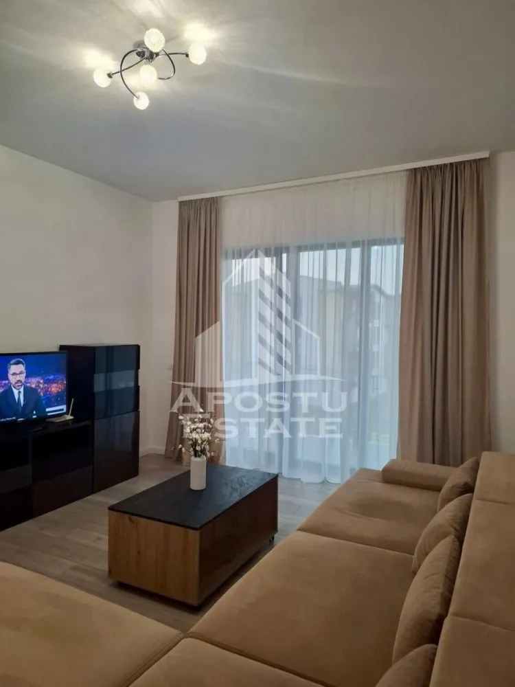 Apartament 2 camere de inchiriat, Giroc, Timisoara - Agentia imobiliara APOSTU ESTATE va propune spre inchiriere un apartament cu 2 camere, spatios si luminos, situat in zona Giroc, o zona linistita si bine pozitionata din Timisoara, potrivit pentru cupluri,familii, sau studenti care isi doresc o locuinta unde sa se simta confortabil si cu acces facil catre statii de autobuz, supermarketuri , magazine de zona, parcuri.

Suprafata utila: 52 mp
Compartimentare eficienta:
-Hol de acces generos
-Bucatarie complet mobilata si utilata, cu loc de luat masa
-Living luminos si spatios
-Dormitor mobilat si utilat
-Baie prevazuta cu cada
-Apartamentul este la prima inchiriere,totul fiind nou

Confort si facilitati:
-Incalzirea apartamentului: centrala proprie
-Incalzire prin pardoseala
-Apartamentul este complet mobilat si utilat
-Se accepta animale de companie de catre proprietar, dar cu anumite conditii

Localizare:
-Timis,Timisoara, zona Giroc – acces facil spre magazine, supermarketuri, scoli, parcuri si mijloace de transport in comun.

Ideal pentru:
-Familii
-Cupluri
-Studenti

Disponibilitate: imediata
Pret chirie lunara: 500
Programeaza o vizionare pentru a-ti putea imagina viitorul aici!
ID intern: CP3218081