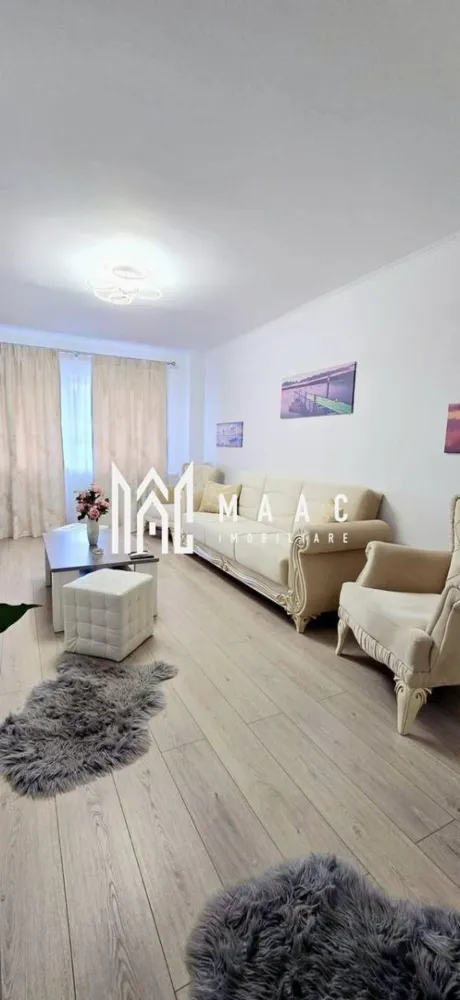 Apartament 3 camere | Nord | Ultra modern | - Apartament 3 camere – Ultra Modern, Strada Republicii, 72 mp, complet renovat, mobilat și utilat MAAC Imobiliare vă propune spre vânzare un apartament ultra modern cu 3 camere, situat pe strada Republicii, într-un bloc de tip R, construit în anii ’90, cunoscut pentru structura solidă și compartimentarea eficientă. Suprafață utilă: 72 mp Etaj: 3 / 4 Locuința impresionează printr-un design contemporan, spațios și luminos, cu vedere panoramică asupra zonei. A fost renovat complet recent, utilizând finisaje premium și mobilier modern, iar vânzarea se face mobilat și utilat complet, exact ca în fotografii – pregătită pentru mutare imediată! Compartimentare: * Living generos, amenajat modern * 2 dormitoare spațioase și luminoase * Bucătărie complet utilată, cu mobilier și electrocasnice moderne * 2 băi elegante * Balcon principal cu vedere deschisă * Balcon suplimentar pe scara de serviciu Dotări și beneficii: * Centrala termică proprie * Finisaje de înaltă calitate * Design interior ultra modern * Boxă proprie pentru depozitare * Bloc din anii ’90, solid și bine întreținut * Zonă liniștită și sigură Localizare: * Strada Republicii, într-o zonă liniștită și accesibilă * În apropiere de școli, magazine, instituții publice și alte facilități importante Un apartament ultra modern, elegant și complet echipat, ideal pentru familii sau persoane care își doresc confort, rafinament și o locație excelentă. Pentru mai multe detalii sau pentru programarea unei vizionări, contactați MAAC Imobiliare. id : CP 2810995 - SP }}