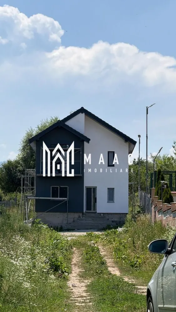 Casa individuala | Constructie noua | 4 camere | Vestem - MAAC Imobiliare va prezinta o casă individuală P+1, situată în localitatea Veștem, la doar 10 minute de Sibiu, ideală pentru o familie care își dorește confort, spațiu și acces rapid către oraș.

Caracteristici:
Casă individuală regim de înălțime P+1
An construcție: 2024
Suprafață utilă: 120 mp
Suprafata totala teren: 338
Suprafata teren liber: 250 mp
Construcție din cărămidă
Predare la cheie la exterior și la alb la interior, cu posibilitate de predare la cheie contra cost
Acoperiș cu țiglă
Deschidere la stradă: 11 ml

Compartimentare:
Parterul este compus din hol de intrare de 12,38 mp, living spațios de 36 mp, bucătărie separată de 11,45 mp, baie de 3,40 mp și acces către terasa din spatele casei, cu o suprafață de 17,32 mp.

Etajul cuprinde 3 dormitoare, fiecare cu balcon propriu, unul dintre dormitoare având o suprafață de 18 mp și posibilitatea de amenajare a unui dressing și a unei băi proprii, precum și o baie comună de 5,23 mp.

Accesul în pod se face din interior, podul fiind înalt și oferind posibilitatea de mansardare.

Dotări și beneficii:
Izolație exterioară cu polistiren de 10 cm
Drum de acces asfaltat
Utilități disponibile: gaz, curent electric și apă
2 locuri de parcare amenajate în fața casei

Localizare:
Situată în Veștem
Distanță până în Sibiu: aproximativ 10 minute
Zonă în plină dezvoltare, ideală pentru locuire permanentă.

Pretul este cu TVA inclus.

Pentru mai multe detalii precizati telefonic ca ati vazut anuntul cu ID: CP2860906