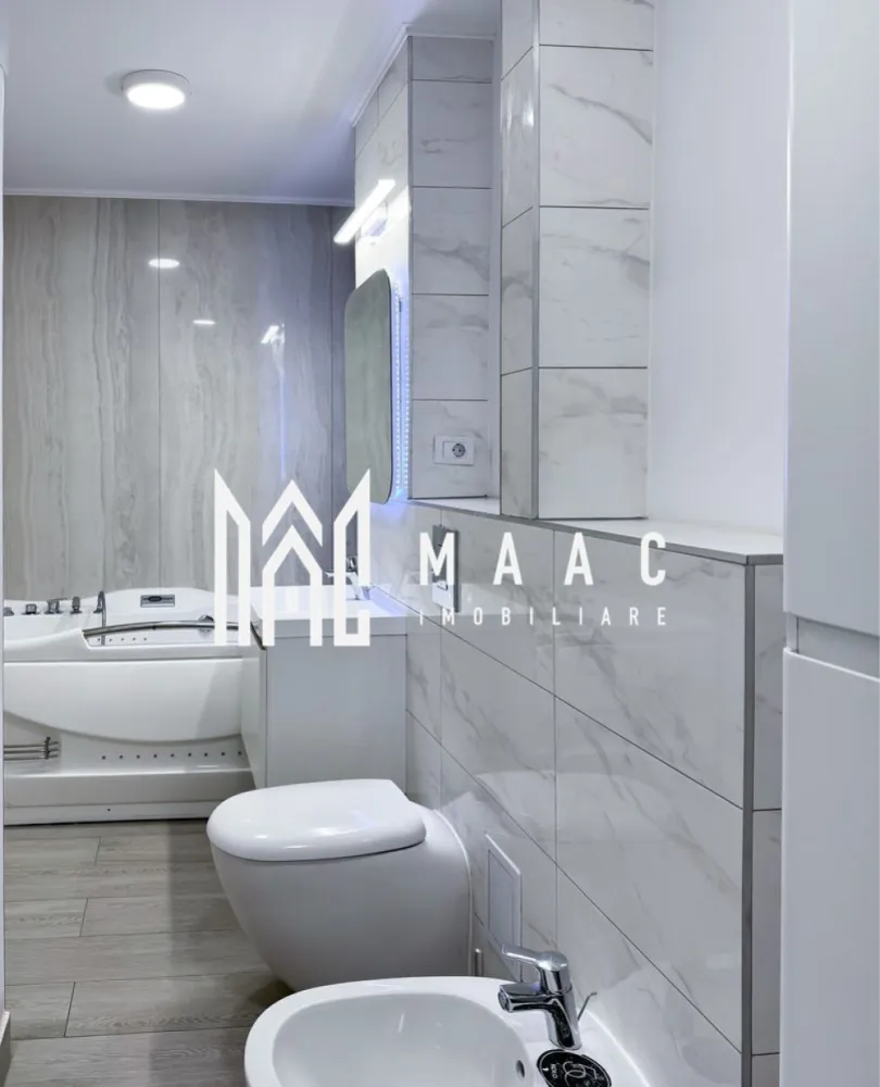 Apartament 4 camere | Nord | centrală | - MAAC IMOBILIARE vă propune spre vânzare un apartament spațios cu 4 camere, situat în Zona Nord – Râmnicu Vâlcea, una dintre cele mai apreciate și bine cotate zone ale orașului. Acest imobil impresionează prin suprafața generoasă, compartimentarea inteligentă și confortul oferit, fiind alegerea ideală pentru o familie care își dorește un cămin modern, bine organizat și poziționat excelent. Localizare premium: Apartamentul este amplasat într-o zonă cu acces facil către toate punctele de interes: supermarketuri, magazine, școli, licee, biserică și mijloace de transport, oferind un stil de viață comod și echilibrat. Detalii tehnice: Suprafață utilă: 90,24 mp Suprafață totală: 96,7 mp Compartimentare: decomandat – 4 camere Etaj: 4 din 5 2 balcoane (unul închis, unul deschis) 2 băi Bucătărie open-space (poate fi utilizată și ca living) Debara pentru depozitare eficientă Compartimentare inteligentă: Dormitor matrimonial, compus din dormitor, dressing generos și baie proprie cu cadă Cameră secundară ideală pentru copil sau oaspeți, cu balcon închis Living spațios (sau al treilea dormitor), cu acces către balcon deschis Baie secundară poziționată pe hol Avantaje și dotări: -Apartament renovat complet în urmă cu 2 ani -Centrală termică proprie pe gaz -2 aparate de aer condiționat -Scară curată și liniștită, cu vecini civilizați Compartimentare practică și luminozitate excelentă Se vinde parțial mobilat: -Mobilier bucătărie inclus -Dressing complet utilat -Băile rămân complet mobilate și echipate Un apartament ideal pentru cei care caută spațiu, confort și o locație excelentă! Pentru mai multe detalii sau programarea unei vizionări, echipa MAAC IMOBILIARE vă stă cu drag la dispoziție! }}