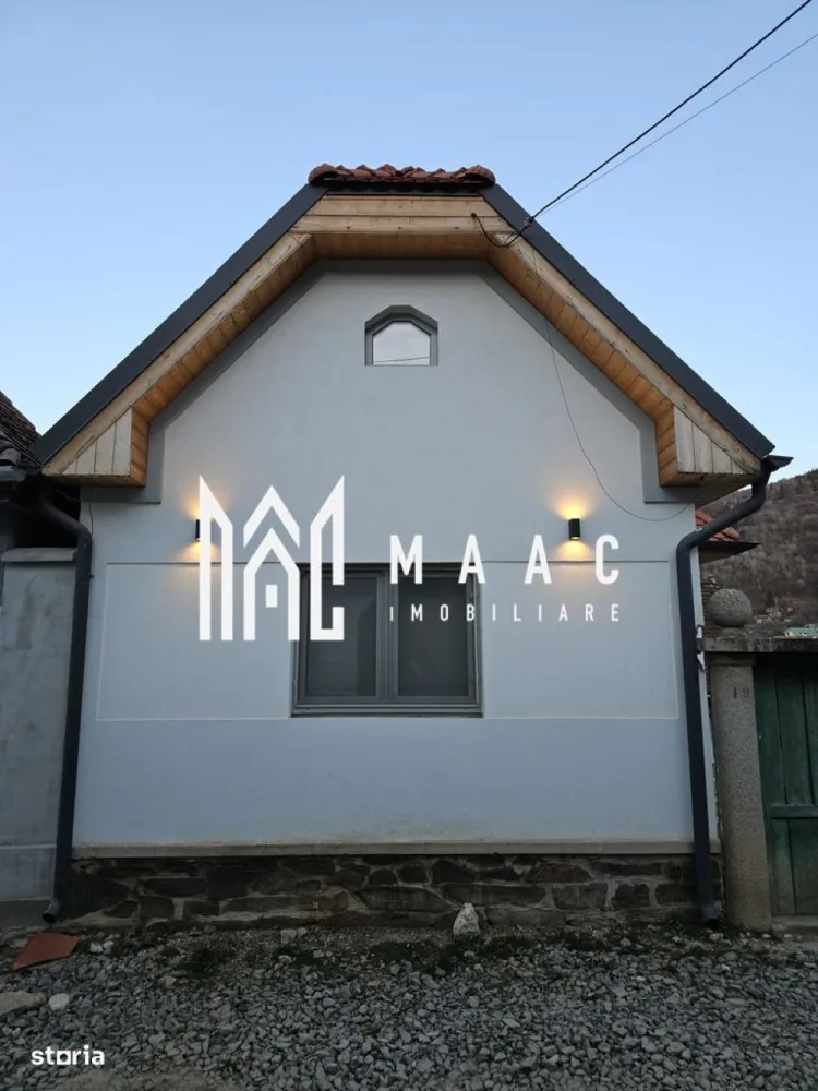 Casă 5 camere | 150 MPU | Teren 360 MPU | Fântânele, Săliște - MAAC Imobiliare vă propune spre vânzare o casă tradițională complet renovată, situată în satul Fântânele, în inima Mărginimii Sibiului, la aproximativ 20 km de Sibiu, o proprietate ce îmbină autenticitatea arhitecturii locale cu standardele moderne de confort, ideală pentru locuință permanentă, casă de vacanță sau investiție turistică. Amplasarea centrală, în apropierea bisericii, pe un teren de colț cu deschidere generoasă și vecinătăți aerisite, oferă un cadru liniștit și o conexiune autentică cu specificul zonei, completată de prezența unei troițe tradiționale care conferă un farmec aparte proprietății. Imobilul este construit din cărămidă, cu fundație din piatră, și a fost renovat integral în perioada 2022–2024, pe baza unui proiect realizat de arhitect, care a păstrat elementele tradiționale și le-a integrat armonios cu soluții moderne pentru un stil de viață contemporan. Suprafața utilă este de aproximativ 150 mp, iar terenul are 360 mp, oferind un echilibru optim între spațiul interior și cel exterior. Compartimentarea este practică și versatilă, desfășurată pe mai multe niveluri: -hol de intrare -living cu zonă de minibar (chicinetă) -dormitor -baie -spațiu open-space la mansardă, cu posibilitate de compartimentare ulterioară -bucătărie la demisol -cameră tehnică cu zonă de spălătorie Proprietatea dispune și de anexe și spații suplimentare care extind funcționalitatea: -al doilea corp de clădire pregătit pentru amenajarea unei bucătării cu dining -șură tradițională păstrată în stare originală, amenajată cu zonă de grătar Renovarea a fost realizată cu atenție la detalii și la durabilitate, incluzând: -structură consolidată și adusă la standarde actuale -plăci de beton turnate la parter -drenaj și hidroizolație completă, inclusiv dren perimetral -tâmplărie PVC cu geam tripan -acoperiș refăcut integral -mansardă izolată cu vată bazaltică -învelitoare din țiglă solzi, în acord cu arhitectura tradițională -posibilitate de parcare în curte -curte parțial amenajată Proprietatea se evidențiază prin caracterul autentic, poziționarea excelentă în sat și priveliștea liberă, oferind o relație armonioasă cu natura și un cadru ideal pentru relaxare. Versatilitatea spațiilor permite adaptarea ușoară atât pentru uz rezidențial, cât și pentru activități turistice. Prețul este la cerere și negociabil. Pentru mai multe detalii și programarea unei vizionări, vă rugăm să ne contactați telefonic și să menționați CP3016492. }}