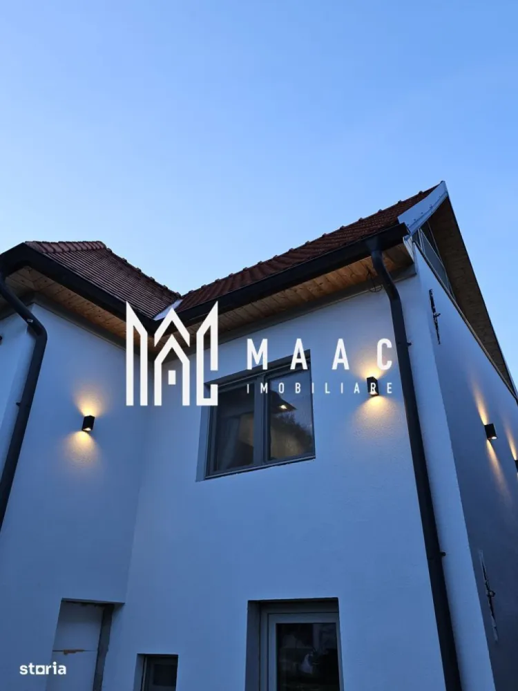 Casă 5 camere | 150 MPU | Teren 360 MPU | Fântânele, Săliște - MAAC Imobiliare vă propune spre vânzare o casă tradițională complet renovată, situată în satul Fântânele, în inima Mărginimii Sibiului, la aproximativ 20 km de Sibiu, o proprietate ce îmbină autenticitatea arhitecturii locale cu standardele moderne de confort, ideală pentru locuință permanentă, casă de vacanță sau investiție turistică. Amplasarea centrală, în apropierea bisericii, pe un teren de colț cu deschidere generoasă și vecinătăți aerisite, oferă un cadru liniștit și o conexiune autentică cu specificul zonei, completată de prezența unei troițe tradiționale care conferă un farmec aparte proprietății. Imobilul este construit din cărămidă, cu fundație din piatră, și a fost renovat integral în perioada 2022–2024, pe baza unui proiect realizat de arhitect, care a păstrat elementele tradiționale și le-a integrat armonios cu soluții moderne pentru un stil de viață contemporan. Suprafața utilă este de aproximativ 150 mp, iar terenul are 360 mp, oferind un echilibru optim între spațiul interior și cel exterior. Compartimentarea este practică și versatilă, desfășurată pe mai multe niveluri: -hol de intrare -living cu zonă de minibar (chicinetă) -dormitor -baie -spațiu open-space la mansardă, cu posibilitate de compartimentare ulterioară -bucătărie la demisol -cameră tehnică cu zonă de spălătorie Proprietatea dispune și de anexe și spații suplimentare care extind funcționalitatea: -al doilea corp de clădire pregătit pentru amenajarea unei bucătării cu dining -șură tradițională păstrată în stare originală, amenajată cu zonă de grătar Renovarea a fost realizată cu atenție la detalii și la durabilitate, incluzând: -structură consolidată și adusă la standarde actuale -plăci de beton turnate la parter -drenaj și hidroizolație completă, inclusiv dren perimetral -tâmplărie PVC cu geam tripan -acoperiș refăcut integral -mansardă izolată cu vată bazaltică -învelitoare din țiglă solzi, în acord cu arhitectura tradițională -posibilitate de parcare în curte -curte parțial amenajată Proprietatea se evidențiază prin caracterul autentic, poziționarea excelentă în sat și priveliștea liberă, oferind o relație armonioasă cu natura și un cadru ideal pentru relaxare. Versatilitatea spațiilor permite adaptarea ușoară atât pentru uz rezidențial, cât și pentru activități turistice. Prețul este la cerere și negociabil. Pentru mai multe detalii și programarea unei vizionări, vă rugăm să ne contactați telefonic și să menționați CP3016492. }}