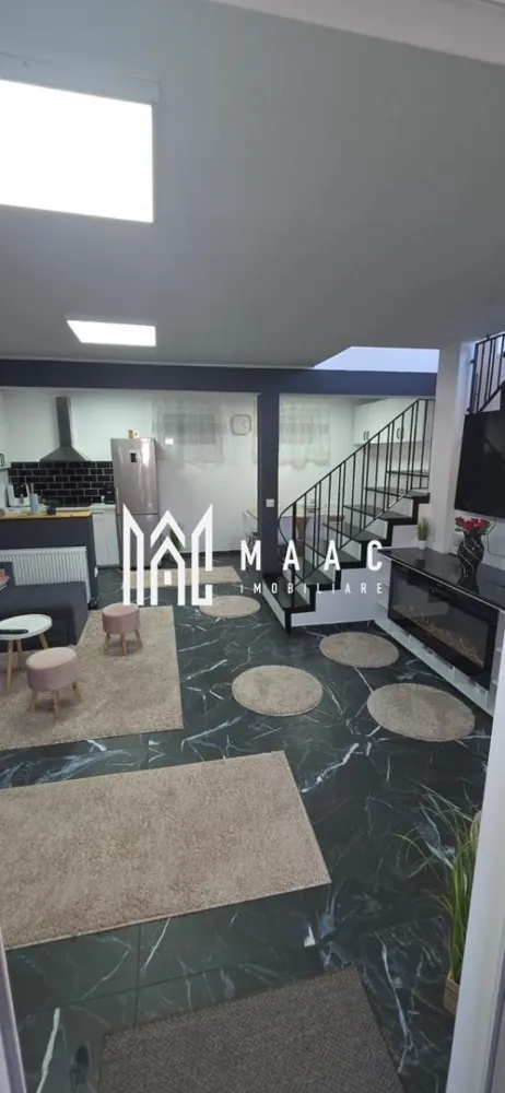 Casa individuala | 4 camere | Acces auto | Selimbar - MAAC Imobiliare vă propune spre vânzare o casă individuală recent renovată, situată într-o zonă liniștită din Șelimbăr, ideală pentru o familie care își dorește confort, intimitate și un spațiu modern gata de locuit. Proprietatea, construită în urmă cu doar 5 ani, are o suprafață utilă de 91 mp și este amplasată pe un teren de 130 mp, cu o amprentă la sol de 60 mp și curte liberă de aproximativ 70 mp. Casa este izolată termic și se vinde complet mobilată și utilată, oferind viitorilor proprietari posibilitatea de a se muta imediat, fără investiții suplimentare. Dotări și beneficii: Izolație exterioară completă; Finisaje moderne, recent renovate integral; Curte amenajată cu grătar și acces auto; Mobilier și electrocasnice incluse în preț; Locație excelentă, cu acces rapid către Sibiu și principalele puncte de interes din Șelimbăr. Această proprietate reprezintă alegerea perfectă pentru cei care caută o casă individuală, modernă, complet amenajată și pregătită pentru mutare imediată. Pentru detalii suplimentare și programarea unei vizionări, contactați echipa MAAC Imobiliare. ID: CP2804407. }}