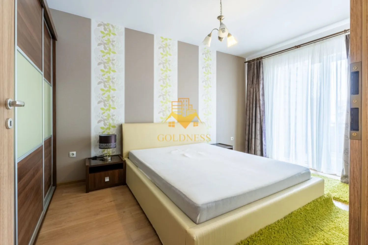 2 camere, modern, garaj, bloc nou,Buna Ziua, Bonjour Residence, Sophia - GOLDNESS Imobiliare vă propune spre închiriere un apartament cu 2 camere complet mobilat și utilat, la etajul 2 într-un imobil de 8 etaje, în Cartierul Buna ZIua. Dispune de loc de parcare exterioara! Se află în apropierea stațiilor de transport în comun, magazine, restaurante, spații verzi, farmacii, etc. Apartamentul este compartimentat astfel: - dormitor cu pat matrimonial, noptiere, spatiu pentru depozitare - living cu canapea exntesibila, spatiu pentru depozitare, TV, dressing - bucatarie complet mobilata, utilata, loc de luat masa - baie cu cada, calorifer port prosop și dulap pentru depozitare. - terasa de 12 mp. Imobilul este dotat cu toate cele necesare- centrală proprie, mașină de spălat haine, frigider, plită electrică, hotă, etc. Dacă sunteți interesați de acest apartament și doriți să îl vizionați, dar și pentru alte oferte nu ezitați să ne contactați telefonic sau prin e-mail. Vă stăm la dispoziție! Pentru intermediere se percepe un comision de 50% din prețul chiriei! }}