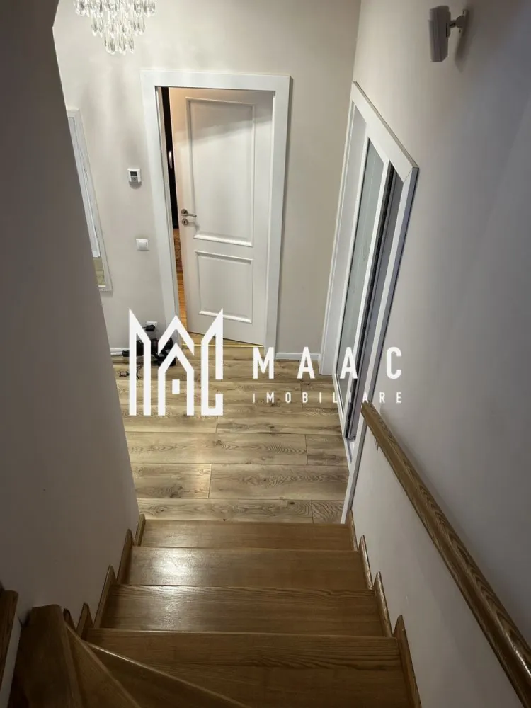 Casă individuală | 120 MPU | Șelimbăr - MAAC vă propune spre vânzare o casă individuală modernă în Șelimbăr – confort, eficiență și intimitate într-o locuință completă Vă prezentăm o proprietate deosebită situată într-un complex rezidențial liniștit, pe strada Fragilor – alegerea ideală pentru o familie care își dorește spațiu, funcționalitate și independență. Avantaje principale: Casă individuală – intimitate totală Suprafață utilă: 120 mp + pod pentru depozitare Teren: 265 mp, cu aproximativ 200 mp curte liberă Construcție nouă (2020), realizată cu materiale și finisaje de calitate Panouri fotovoltaice 5kW (prosumator) – eficiență energetică ridicată Încălzire în pardoseală pentru confort sporit Compartimentare practică și echilibrată: Parter: Living generos cu bucătărie open-space Acces direct către terasa acoperită de 20 mp Grup sanitar Cămară / spațiu de depozitare Hol + casa scării Etaj: Dormitor matrimonial (24 mp) cu dressing și baie proprie 2 dormitoare spațioase (13,5 mp fiecare) Baie comună, accesibilă din hol Pod: ideal pentru depozitare Exterior: Terasă acoperită amenajată (20 mp) – perfectă pentru relaxare Carport (22 mp) Curte liberă amenajată – ideală pentru timp petrecut în aer liber Porți automatizate și sistem de alarmă Iluminat exterior Dotări și beneficii suplimentare: Se vinde parțial mobilată (bucătărie, băi, dressing) Toate utilitățile disponibile Acces facil pe drumuri publice O locuință modernă, eficientă și pregătită să devină “acasă” pentru noua dumneavoastră familie. Pentru mai multe detalii și programarea unei vizionări, vă rugăm să ne contactați telefonic și să menționați : CP3023470 }}