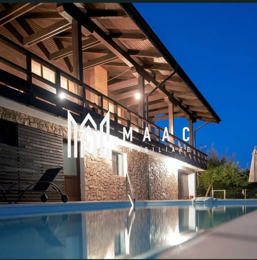 Pensiune turistică 5★ de vânzare în Băile Olănești | Proprietate premium - MAAC IMOBILIARE vă propune spre vânzare o proprietate deosebită, situată în stațiunea Băile Olănești, una dintre cele mai apreciate destinații turistice din România, renumită pentru aerul curat și izvoarele sale minerale. Această vilă turistică clasificată la standard de 5★ reprezintă alegerea ideală atât pentru o afacere profitabilă în domeniul turismului, cât și pentru o casă de vacanță exclusivistă sau locuință permanentă, fiind situată la doar aproximativ 35 de minute de Râmnicu Vâlcea. Proprietatea este amplasată pe un teren generos de 850 mp, având o suprafață construită de 200 mp și o arie desfășurată de 300 mp, fiind compartimentată eficient pentru confort și funcționalitate. Compartimentare și dotări: 6 camere spațioase, amenajate modern Living generos, ideal pentru relaxare Bucătărie complet echipată Terasă exterioară cu grătar Zonă de șezlonguri pentru relaxare Facilități premium: Piscină exterioară Saună Jacuzzi Șemineu tip centrală în living Confort și utilități: Centrală pe lemne Centrală electrică Toate utilitățile disponibile Proprietatea este perfect adaptată pentru a funcționa imediat ca pensiune turistică la cheie, beneficiind deja de clasificare oficială, dar oferă în același timp intimitatea și confortul unei locuințe private într-un cadru natural deosebit. Datorită poziționării excelente și facilităților de top, această vilă reprezintă o investiție sigură și profitabilă, într-o zonă cu cerere turistică ridicată pe tot parcursul anului. Pentru mai multe detalii și programări la vizionare, echipa MAAC IMOBILIARE vă stă la dispoziție! CP3029231 }}