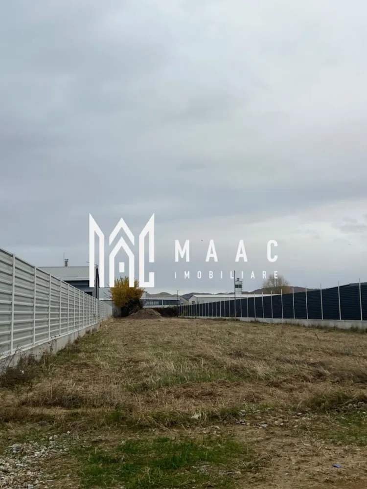 Teren | Budesti | Zona industriala - TERENURI INDUSTRIALE – BUDEȘTI, ZONA INDUSTRIALĂ – MAAC IMOBILIARE MAAC Imobiliare vă propune spre vânzare două terenuri situate în zona industrială a localității Budești, la doar 300 de metri de strada principală, ideale pentru dezvoltări comerciale sau industriale. Caracteristici principale: * Suprafață teren 1: 1.850 mp * Suprafață teren 2: 1.750 mp * Deschidere: 17 metri liniari la drum pentru fiecare parcelă * Acces facil pentru camioane și utilaje * Utilități disponibile în zonă * Drum de acces bun, aproape de artera principală Destinație și potențial: Terenurile sunt pretabile pentru construcția de hale industriale, spații de depozitare, ateliere sau alte activități economice. Zona este în plină dezvoltare, oferind multiple oportunități de investiție. Preț: 82000 EURO / parcelă Contact MAAC Imobiliare pentru detalii suplimentare, vizionare sau consultanță privind achiziția. Aceste terenuri reprezintă o investiție ideală pentru dezvoltatori sau antreprenori care caută o locație accesibilă și funcțională în zona industrială Budești, specificand ID: CP2802354 }}