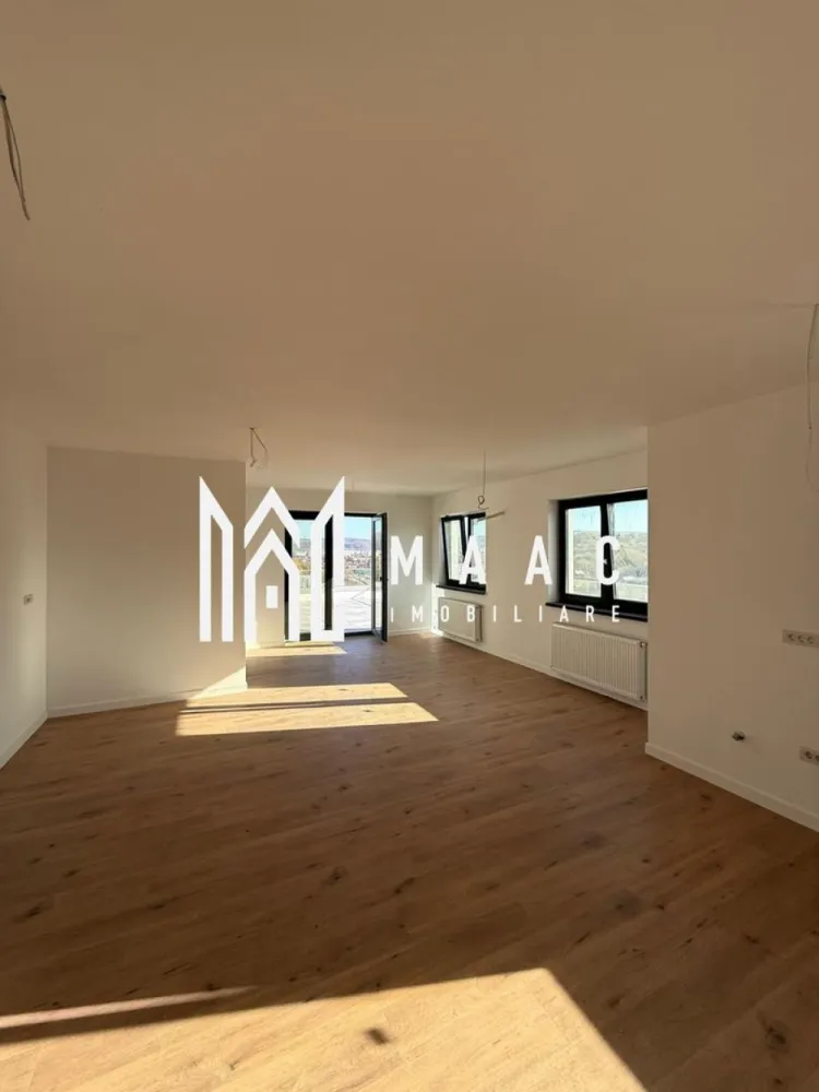 Apartament | Penthouse | 3 camere | Central - PENTHOUSE EXCLUSIV – 3 CAMERE, TERASĂ PANORAMICĂ, ZONA CENTRALĂ – MAAC IMOBILIARE MAAC Imobiliare vă propune spre vânzare un apartament tip penthouse elegant și modern, situat în zona centrală a orașului, care îmbină perfect confortul, rafinamentul și priveliștea spectaculoasă. Caracteristici principale: * Living generos cu bucătărie open-space, modern amenajat, cu ieșire directă pe terasa panoramică * 2 dormitoare luminoase, fiecare având acces propriu către terasă * 2 băi complet utilate, cu finisaje moderne * Terasă impresionantă, ideală pentru relaxare, seri în aer liber sau momente petrecute alături de familie și prieteni * Loc de parcare subteran inclus în preț * Finisaje premium, atenție la detalii și materiale de calitate superioară * Se predă la cheie, exact ca în fotografii Avantaje și locație: * Poziționare excelentă, în zona centrală * În apropiere de Baza sportivă și Parcul Zavoi * Acces facil către magazine, restaurante, școli și mijloace de transport Alte detalii: Se acceptă schimburi cu apartament de 2 camere sau teren, plus diferență din partea cumpărătorului. Contact MAAC Imobiliare pentru detalii suplimentare sau pentru a programa o vizionare! Acest penthouse reprezintă alegerea ideală pentru cei care caută lux, confort și o priveliște de neuitat asupra orașului. id: CP2798771 - SP }}