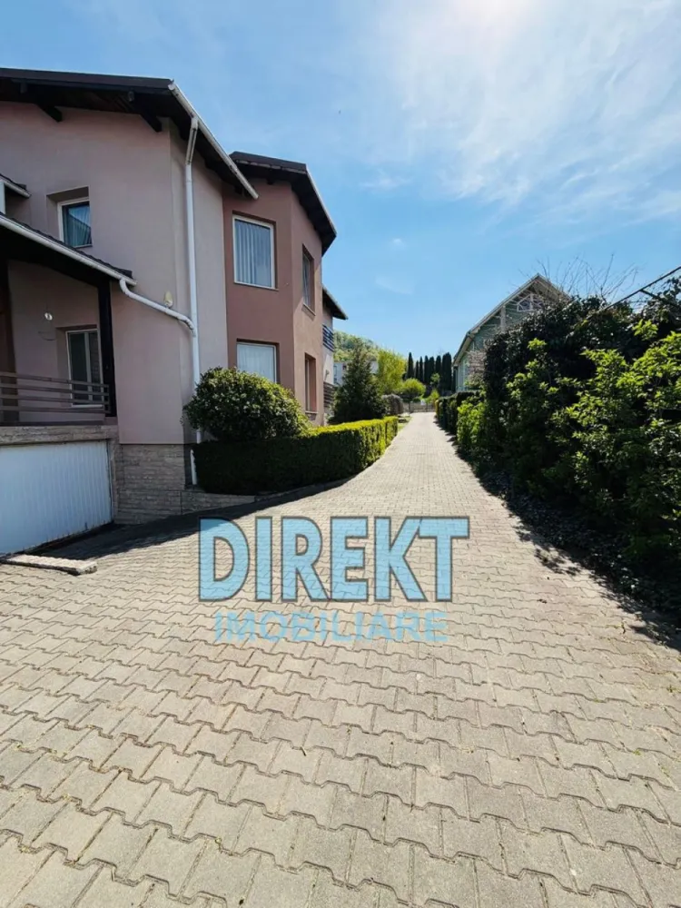 Casa individuala , zona Valea Ghinzii, si 2100 mp teren aferent - Descopera un colt de liniste si frumusete naturala, perfect pentru a deveni “acasa” Agentia Direkt Imobiliare va propune spre vanzare casa individuala, situata in localitatea Bistrita, str. Valea Ghinzii. Imobilul este construit in anul 2000 si renovat in anul 2010, in regim de inaltime D+P+E+M. Suprafata construita a casei este de 340 mp, respectiv 282 mp suprafata utila, fiind compartimentata astfelꓽ la demisolꓽ hol, camera centralei si 4 incaperi pentru depozitarea organizata a lucrurilorꓼ la parterꓽ hol, living, birou, baie, bucatarie inchisa cu iesire pe terasa, camara alimente, spatiu depozitareꓼ la etajꓽ hol, baie, 3 dormitoare, dintre care unul cu baie proprie, balcon inchis, terasaꓼ mansardaꓽ loc depozitare. Casa este izolata, dispune de geamuri termopan, incalzirea fiind asigurata de centrala termica pe gaz + semineu pe lemne, garaj in suprafata de 20 mp, fantana, acces securizat, poarta electrica. Proprietatea se bucura de o curte generoasa, atent intretinuta, cu alei pavate, gazon, diverse flori, tuia si o livada cu pomi fructiferi, totul in suprafata de 2.100 mp, perfecte pentru momente de relaxare in aer liber. Aceasta este alegerea ideala pentru cei care isi doresc confort, liniste si o conexiune autentica cu natura, fara a renunta la accesibilitate. Casa se vinde utilata si mobilata! }}