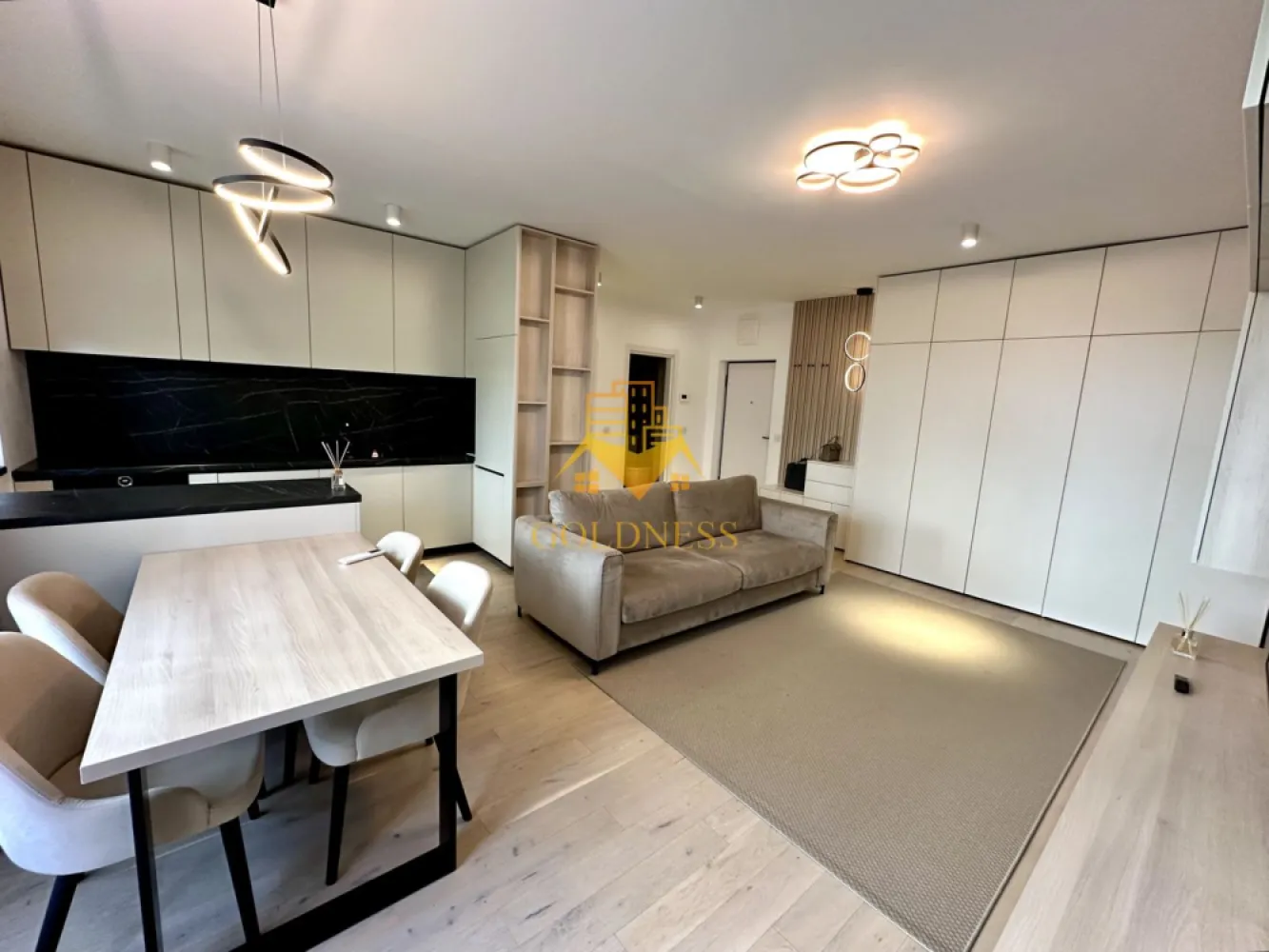 2 camere LUX, Semi Central, Gradina, Record Park, Parcare, The Office - GOLDNESS Imobiliare vă propune spre închiriere un apartament cu 2 camere complet mobilat și utilat, la Parter într-un imobil de 5 etaje, situat Semi Central în complex rezidențial Record Park. Dispune de loc de parcare subterana. Se află în apropierea stațiilor de transport în comun, magazine, restaurante, spații verzi, farmacii, etc. Apartamentul este compartimentat astfel: - dormitor cu pat matrimonial, dressing, noptiere - living cu canapea extensibilă - bucătărie complet open space utilată și mobilată, loc de servit masa - baie cu cabina de dus, calorifer port prosop și dulap pentru depozitare. - gradina privata 77 mp. Imobilul este dotat cu toate cele necesare- centrală pe imobil cu contorizare separată, frigider, aragaz, hotă, mașină de spălat haine și vase, etc. Dacă sunteți interesați de acest apartament și doriți să îl vizionați, dar și pentru alte oferte nu ezitați să ne contactați telefonic sau prin e-mail. Vă stăm la dispoziție! Pentru intermediere se percepe un comision de 50% din prețul chiriei! }}