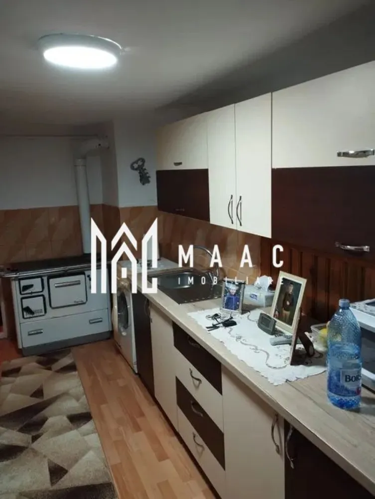 Casă 4 dormitoare | Curte și grădină | 29 km de Sibiu | Utilități complete - MAAC Imobiliare vă propune spre vânzare o casă situată la 29 km de Sibiu, ideală pentru cei care își doresc liniște, spațiu și un stil de viață aproape de natură. Detalii proprietate Casă izolată termic exterior Utilități complete: gaz, electricitate, apă curentă, canalizare Încălzire cu centrală proprie Curte generoasă + anexe gospodărești Compartimentare 4 dormitoare Bucătărie Cămară Baie 2 holuri la intrare 2 pivnițe — ideale pentru depozitare Exterior Grădină cu pomi fructiferi și viță de vie Curte mare, potrivită pentru relaxare sau activități gospodărești Anexe utile pentru depozitare sau creșterea animalelor Avantaje Zonă liniștită, departe de agitația orașului Toate utilitățile disponibile Spațiu generos interior și exterior Ideală pentru familie sau casă de vacanță 📞 Contactează-ne pentru mai multe detalii sau pentru a programa o vizionare, menționează CP2965788! }}