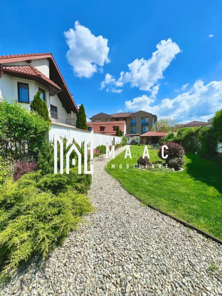 Casa individuala | 6 camere | Teren 863 MP | Selimbar - MAAC Imobiliare vă propune spre cumpărare o Casă/Vilă cu teren însumat de 863 mp. Suprafață si Configurație corp principal : Suprafață utilă: 155 mp Structurată pe două niveluri: parter, mansardă (+pod amenajat) Parterul oferă: Bucătărie open space cu loc de servire a mesei în suprafață totală de 30 mp Living cu ieșire la terasă Baie cu duș Birou sau cameră hobby Spațiu de depozitare Terasa acoperită perfecta pentru seri intime Mansarda include : Trei dormitoare ,unul matrimonial și două de copii Baie cu cadă de hidromasaj Pod amenajat utilizabil ca și loc de joacă sau dressing generos Curte : Garaj + carport Terasă liberă Curte pavată Grădină : 355 mp de zonă verde cu iaz de pești , loc de depozitare și foișor Suprafața si Configurația corp secundar: Rămâne să il descoperiți la vizionare Atuuri: Pretabilă două familii Trei căi de acces către Sibiu Zonă cu multă liniște și intimitate Orientare cardinală optimă E-S-V Pentru mai multe detalii, precizati telefonic ca ati vazut anuntul cu ID: CP2540800