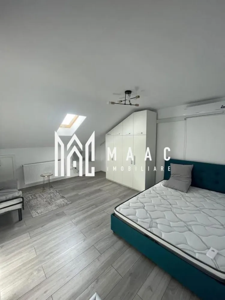 Apartament 1 cameră I 36 mpu I Utiliat I Parcare I Turnișor - MAAC Imobiliare propune spre închiriere un apartament nou, situat la mansarda unui bloc cu 4 etaje din cartierul Turnișor, Sibiu.

Suprafață utilă: 36 mp + spații de depozitare
Compartimentare: cameră de zi, bucătărie închisă, baie cu duș walk‑in
Stare: mobilat și utilat complet

Dotări incluse:
mașină de spălat haine
mașină de spălat vase
plită pe gaz
cuptor electric
frigider
aer condiționat
TV

Apartamentul este situat într-un ansamblu rezidențial nou din Turnișor, într-o zonă ușor accesibilă, aproape de:
transport în comun
magazine
zona industrială de Vest

Condiții de închiriere:
Nu acceptăm fumători
Nu acceptăm animale de companie
închiriere pe termen lung
la semnarea contractului se achită: garanția (echivalentul unei chirii) + chiria lunii în curs

Pentru mai multe detalii, contactați MAAC Imobiliare, menționând ID CP3046631.