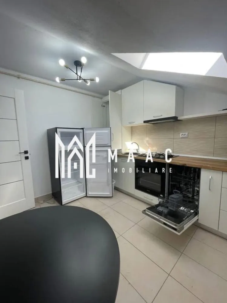 Apartament 1 cameră I 36 mpu I Utiliat I Parcare I Turnișor - MAAC Imobiliare propune spre închiriere un apartament nou, situat la mansarda unui bloc cu 4 etaje din cartierul Turnișor, Sibiu.

Suprafață utilă: 36 mp + spații de depozitare
Compartimentare: cameră de zi, bucătărie închisă, baie cu duș walk‑in
Stare: mobilat și utilat complet

Dotări incluse:
mașină de spălat haine
mașină de spălat vase
plită pe gaz
cuptor electric
frigider
aer condiționat
TV

Apartamentul este situat într-un ansamblu rezidențial nou din Turnișor, într-o zonă ușor accesibilă, aproape de:
transport în comun
magazine
zona industrială de Vest

Condiții de închiriere:
Nu acceptăm fumători
Nu acceptăm animale de companie
închiriere pe termen lung
la semnarea contractului se achită: garanția (echivalentul unei chirii) + chiria lunii în curs

Pentru mai multe detalii, contactați MAAC Imobiliare, menționând ID CP3046631.