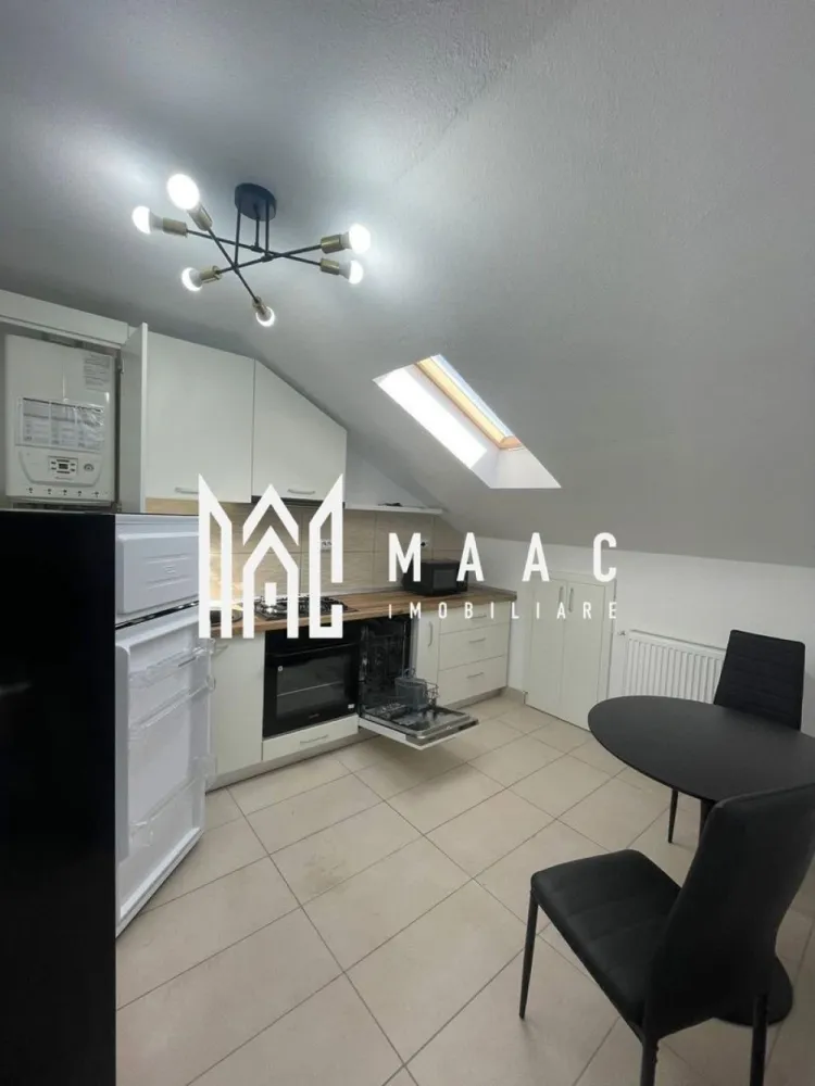 Apartament 1 cameră I 36 mpu I Utiliat I Parcare I Turnișor - MAAC Imobiliare propune spre închiriere un apartament nou, situat la mansarda unui bloc cu 4 etaje din cartierul Turnișor, Sibiu.

Suprafață utilă: 36 mp + spații de depozitare
Compartimentare: cameră de zi, bucătărie închisă, baie cu duș walk‑in
Stare: mobilat și utilat complet

Dotări incluse:
mașină de spălat haine
mașină de spălat vase
plită pe gaz
cuptor electric
frigider
aer condiționat
TV

Apartamentul este situat într-un ansamblu rezidențial nou din Turnișor, într-o zonă ușor accesibilă, aproape de:
transport în comun
magazine
zona industrială de Vest

Condiții de închiriere:
Nu acceptăm fumători
Nu acceptăm animale de companie
închiriere pe termen lung
la semnarea contractului se achită: garanția (echivalentul unei chirii) + chiria lunii în curs

Pentru mai multe detalii, contactați MAAC Imobiliare, menționând ID CP3046631.
