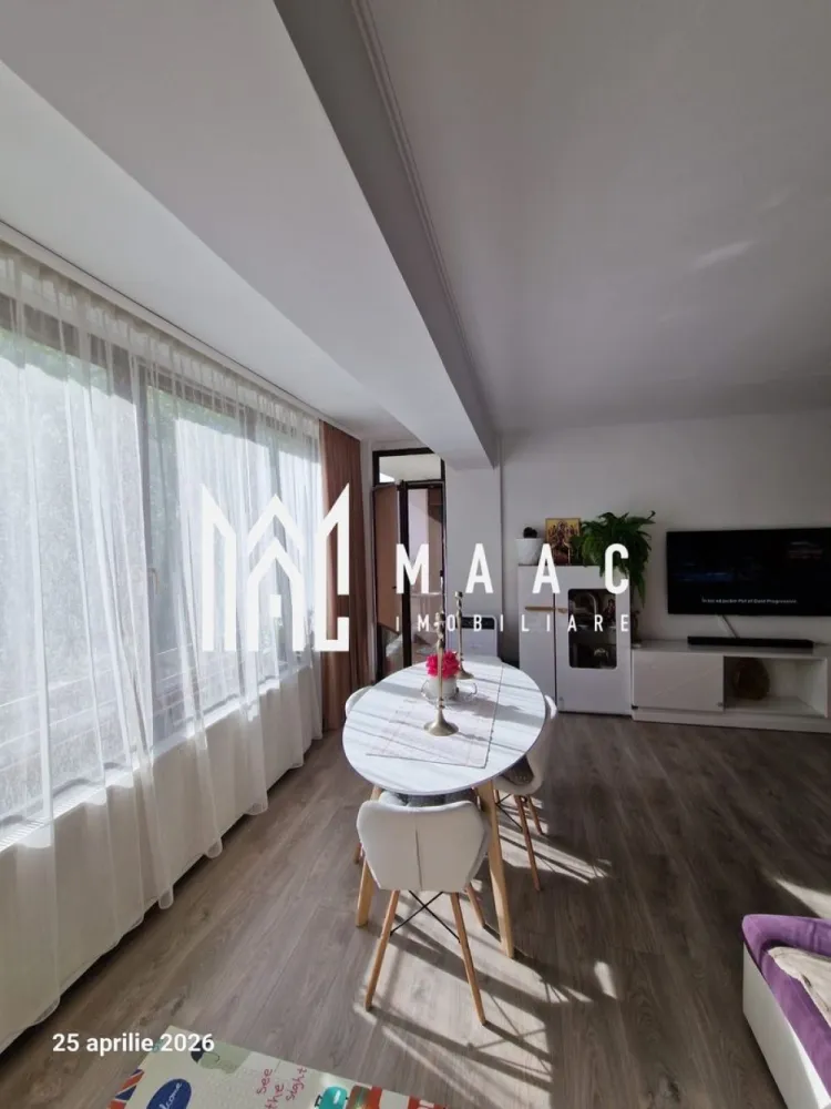 Apartament 3 camere | 79 MPU | Etajul 1 | Doamna Stanca - MAAC Imobiliare vă prezintă un apartament modern cu 3 camere, decomandat, cu poziționare vestică, situat la etajul 1/8 al unui imobil dotat cu lift. În proximitate se află centre comerciale, precum Shopping City Sibiu, Kaufland, LIDL, precum și școli, grădinițe, mijloace de transport în comun și spații verzi.

Compartimentare :

- Hol generos, cu acces către toate încăperile
- Living spațios cu bucătărie open-space
- 2 dormitoare matrimoniale
- 2 Băi, cea principală fiind dotată cu cabină de duș și sistem de ventilație, iar cea secundară fiind amenajată ca spațiu de depozitare (debara)
- Balcon de 4 mp 

Se vinde mobilat și utilat, astfel cum se prezintă în poze.
Ideal pentru locuire personală sau investiție.

Pentru mai multe detali sau vizionări, specificați anunțul cu CP3055995