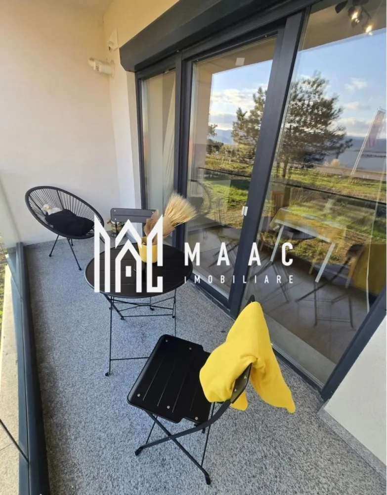 Apartament 2 Camere I Sibiu I DaVinci | Mobilat si Utilat - MAAC Imobiliare propune spre vânzare un apartament modern cu 2 camere, situat în cartierul DaVinci din Sibiu, una dintre cele mai căutate zone rezidențiale, cu cerere ridicată pentru închiriere. Proprietatea reprezintă o oportunitate excelentă atât pentru locuit, cât și pentru investiție, având potențial foarte bun de închiriere datorită poziționării, calității construcției și dotărilor premium. Apartamentul se vinde complet mobilat și utilat, fiind pregătit pentru mutare sau închiriere imediată. Caracteristici generale: Suprafață utilă: 50 mp Compartimentare: decomandat Etaj: parter din 2 Imobil tip vilă, construcție din cărămidă An construcție: 2025 Apartament intabulat Loc de parcare inclus Compartimentare: Dormitor Living cu bucătărie open space Baie Hol 2 terase cu pardoseală din granit și balustrade din sticlă Balcon de 7 mp Orientare sudică – apartament luminos Dotări și finisaje: Centrală termică proprie Încălzire în pardoseală Parchet, gresie, faianță de calitate Terase amenajate cu granit Storuri electrice exterioare Videointerfon Instalații sanitare moderne Electrocasnice noi Complet mobilat și utilat Avantaje investiționale: Zonă cu cerere ridicată pentru închiriere Cartier modern, foarte căutat în Sibiu Posibilitate de închiriere imediată fără investiții suplimentare Randament atractiv datorită poziționării și dotărilor Ideal pentru închiriere pe termen lung sau regim hotelier Avantaje locație – DaVinci Sibiu: Spații verzi generoase Aer curat și liniște Zonă rezidențială în plină dezvoltare Acces facil către oraș Apartament de vânzare în Sibiu, ideal pentru cumpărători care caută siguranță, confort și o investiție imobiliară profitabilă. Pentru mai multe informații sau pentru programarea unei vizionări, vă rugăm să ne contactați și să menționați ID-ul proprietății: CP3026220.