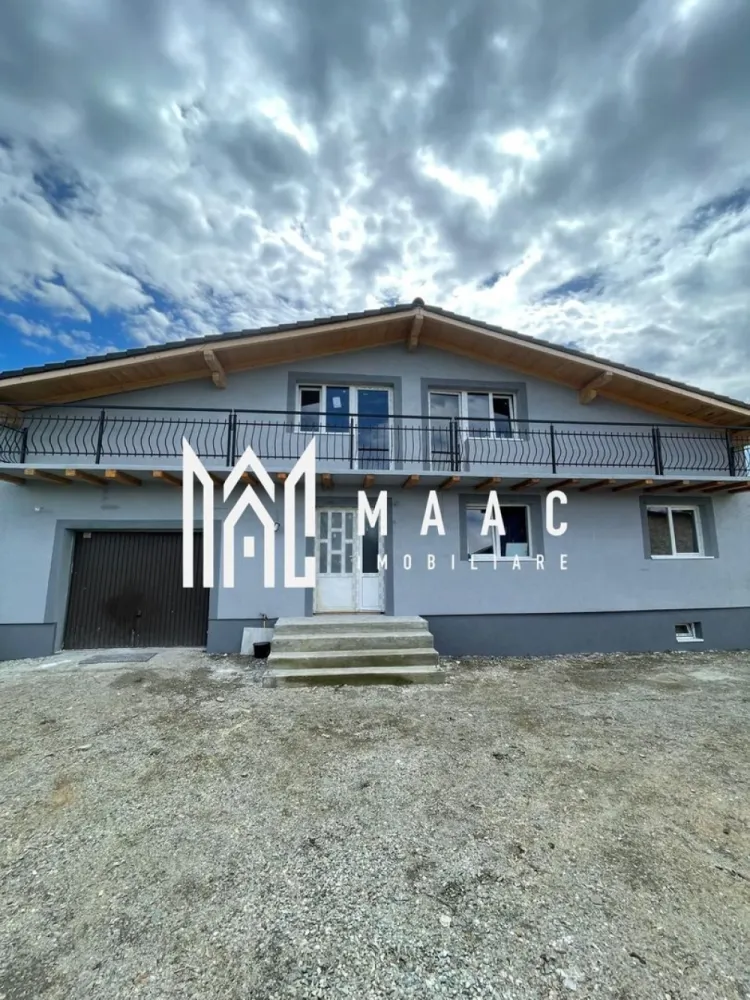 Casă individuală I 240 MPU I Teren 650 MP I Cornețel-Sibiu - MAAC Imobiliare va propune spre vanzare o casă individuală spațioasă, situată în Cornețel, la doar 15 km de Sibiu – ideală pentru cei care își doresc liniște, aer curat și acces rapid către oraș. Detalii proprietate: Suprafață utilă: 240 mp Compartimentare: 4 camere decomandate 3 băi 2 dressing-uri 2 balcoane Pivniță Garaj Teren: Suprafață teren: 650 mp Posibilitate extindere teren până la 1500 mp Stadiu și construcție: Construcție nouă Se predă la stadiul de „alb”, exact ca în fotografii Ideală pentru personalizare după propriul gust Alte informații: Toate actele sunt în regulă Se poate achiziționa și prin credit ipotecar Această proprietate reprezintă o alegere excelentă pentru o locuință de familie, oferind spațiu generos atât în interior, cât și în exterior. Pentru mai multe detalii si programarea unei vizionari va rugam sa specificati ID: CP3062621. }}