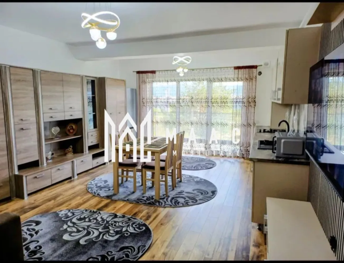 Apartament 1 Camera I 37MPU I Etaj 1 I Loc de parcare - MAAC Imobiliare vă propune spre închiriere o garsonieră modernă, situată la etajul 1 al unei vile cu 3 niveluri, în ansamblul rezidențial DaVinci Homes – una dintre cele mai căutate și apreciate zone din vestul Sibiului. Locuința dispune de o suprafață utilă de 37 mp, la care se adaugă un balcon de 7,5 mp, perfect pentru momente de relaxare. Garsoniera se predă complet mobilată și utilată cu electrocasnice de ultimă generație: centrală termică proprie cu încălzire în pardoseală, plită mixtă și cuptor electric, mașină de spălat vase, mașină de spălat rufe cu uscător, combină frigorifică, cuptor cu microunde, Smart TV de 139 cm și jaluzele electrice. Datorită orientării sudice, locuința este foarte luminoasă și economică, asigurând un nivel ridicat de confort termic și vizual. În prețul de închiriere este inclus și un loc de parcare privat, amplasat în fața imobilului. Garsoniera este la prima închiriere și reprezintă o alegere ideală pentru o persoană sau un cuplu care își dorește confort, liniște și acces rapid către centrul orașului. Detalii suplimentare: Suprafață utilă: 37 mp + balcon 7,5 mp Etaj: 1/3 Parcare privată inclusă Primă închiriere Complet mobilată și utilată Orientare sudică Pentru mai multe detalii și vizionări, precizati telefonic ca ati vazut anuntul cu ID:CP2785156 }}