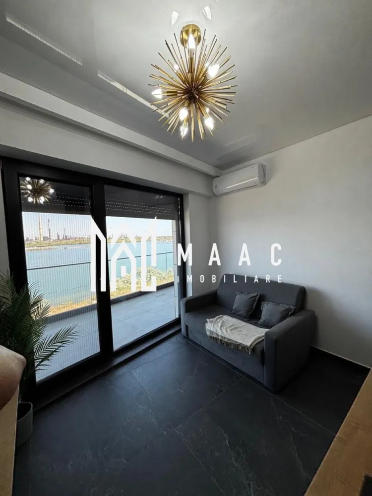Apartament 2 camere | Vedere spre Mare | Etaj 2 - Apartament cu vedere la mare – Mamaia Nord | 45 mp | MAAC Imobiliare MAAC Imobiliare vă propune spre vânzare un apartament superb situat în Mamaia Nord, cu vedere directă la mare, într-un bloc modern cu fațadă ventilată , construit la standarde premium. Suprafață utilă:45 mp Compartimentare:living cu bucătărie open-space, dormitor, baie, balcon Vedere: panoramică spre mare Dotări și avantaje: * Mobilat și utilat complet, gata pentru locuire sau închiriere * Aer condiționat * Centrală proprie pe gaz * Finisaje moderne, de calitate superioară * Bloc cu fațadă ventilată – eficiență energetică și izolare excelentă * Locație excelentă, la doar câțiva pași de plajă, restaurante și puncte de interes Ideal pentru: * Locuință de vacanță * Investiție profitabilă (închiriere sezonieră sau pe termen lung) Pentru detalii suplimentare și programarea unei vizionări, contactați MAAC Imobiliare. id-CP2781840 }}