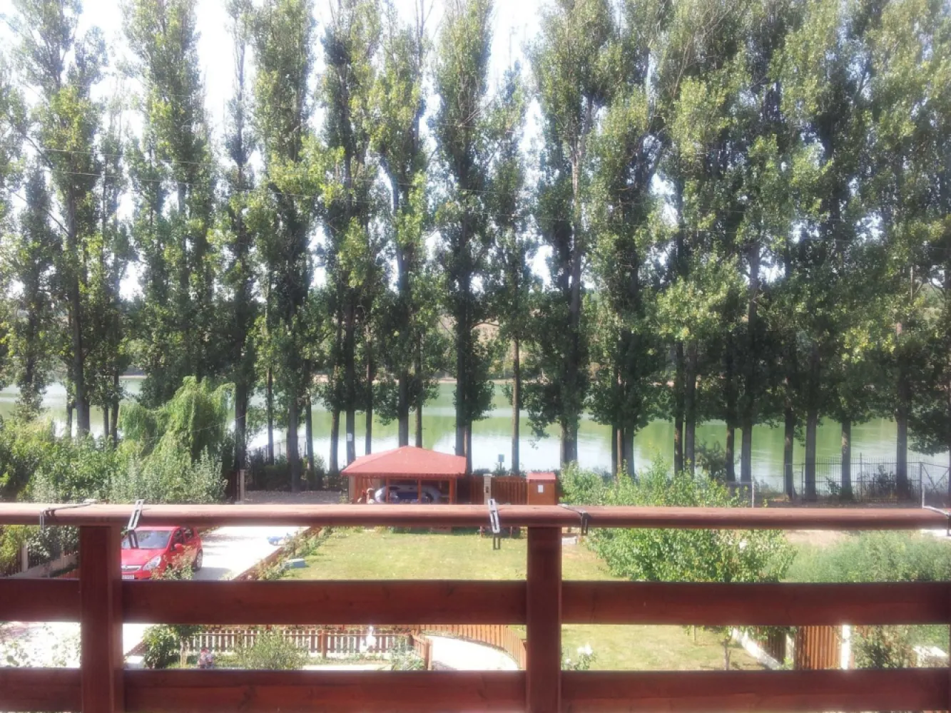 Vand/Inchiriez Casa 460mp+teren 1090mp Lac Ezareni - 1250euro/mp - Vand teren 1082mp+Casa 479mp(construita in 2008) pe malul lacului Ezareni in Sat Valea Adanca ; Utilitati: apa, put forat,energie electrica trifazic, generator, canalizare, gaz, fibra optica,strada asfalt bituminos ; Dotari: c.t.gaz=2buc , a.c.=4buc , tamplarie PVC , sistem CCTV , sistem alarma ; Fatada renovata in 2021 ; Constructie - Beton armat, caramida, termosistem de 10mm ; Curte : Alei pavate, Livada, Foisor ; Lac : 17ml deschidere la lac + ponton realizat cu proiect : Subsol : Garaj + Camere depozitare - 104mp ; Parter : Living+Bucatarie+Baie+Birou+Camera tehnica - 130mp; Etaj 1 : Living+3Camere+Baie+3Balcoane - 127mp ; Etaj 2 : Living+3Camere+Baie+3Balcoane - 116mp ;
