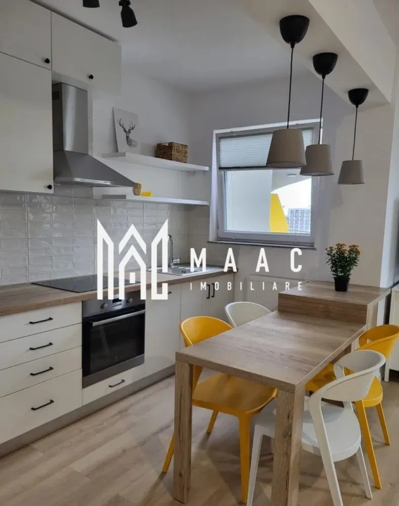 Apartament 2 camere | Balcon | Parcare | Hipodrom 3 - MAAC Imobiliare vă propune spre închiriere un apartament modern și primitor, aflat la prima închiriere, situat într-un imobil nou, dotat cu lift și loc de parcare privat, în zona Cireșica – Sibiu. Detalii apartament: Suprafață utilă: 58 mp Compartimentare: living generos cu bucătărie open-space, dormitor spațios, baie modernă și balcon de 12 mp, cu priveliște spectaculoasă spre Munții Făgăraș și Cindrel. Dotări și facilități: Complet mobilat și utilat modern Electrocasnice de ultimă generație: mașină de spălat vase, frigider, mașină de spălat și uscător de haine, televizor, aer condiționat Dormitor izolat fonic pentru confort sporit Clădire nouă cu lift și loc de parcare inclus Se percepe o garanție în valoare echivalentă cu o lună de chirie, achitată la semnarea contractului. Pentru mai multe detalii sau pentru a programa o vizionare, vă rugăm să ne contactați. Specificați ID-ul CP2777316. }}